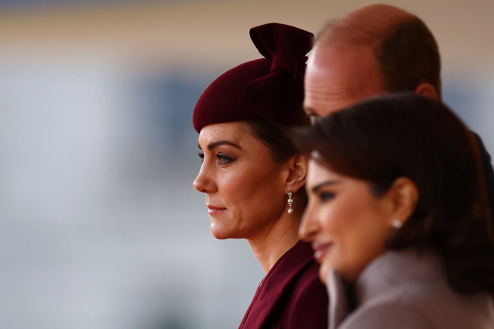 Britain's Kate, Princess of Wales and Prince William arrive to welcome the Emir of the State of Qatar Sheikh Tamim bin Hamad Al Thani and Sheikha Jawaher bint Hamad bin Suhaim Al Thani, right, in London, Tuesday, Dec. 3, 2024. (Henry Nicholls, Pool via AP)