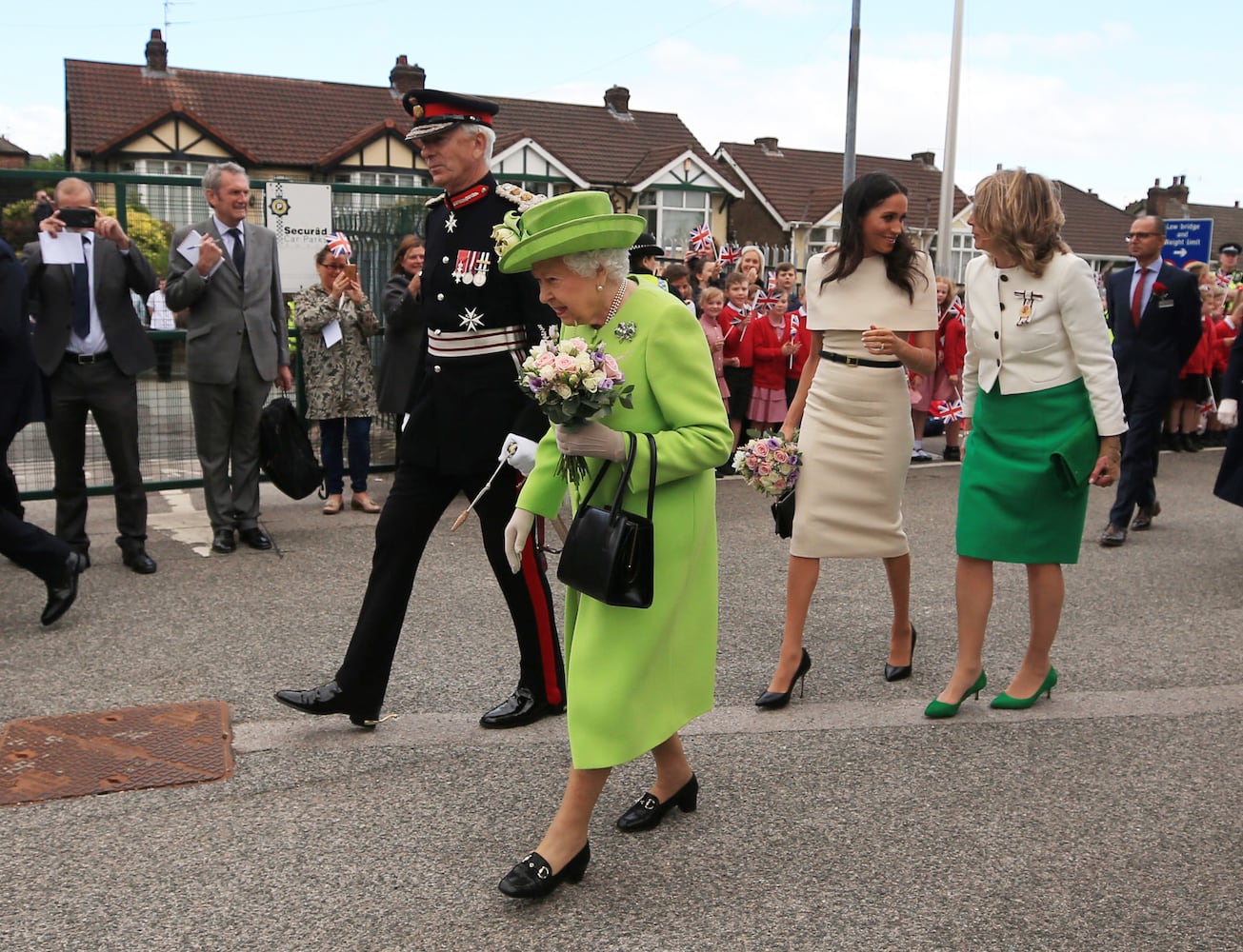 Photos: Meghan Markle stuns at first solo outing with Queen Elizabeth