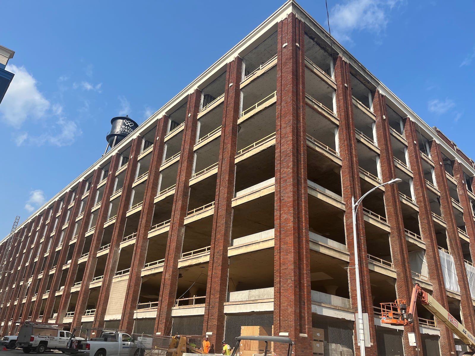 The Delco, the former Mendelsons building, is under construction in Webster Station in downtown Dayton. CORNELIUS FROLIK / STAFF