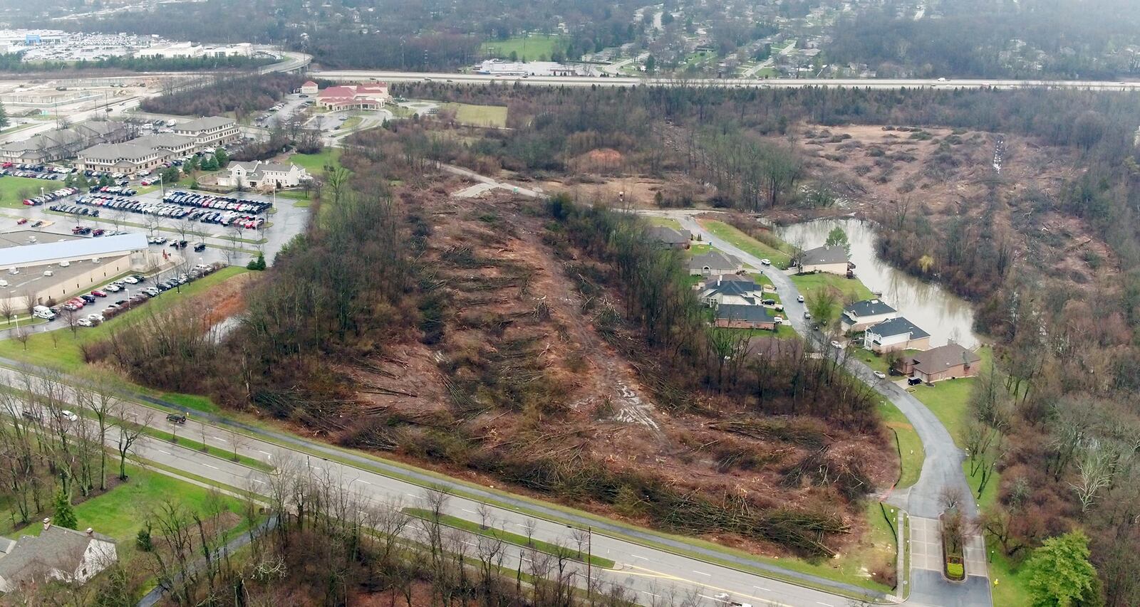 Site preparation for the construction of 360 new apartments in Centerville is taking place between Alex-Bell Road, foreground, and I-675 near Loop Road.  Construction of the Gateway Lofts is expected to begin in the coming months.    TY GREENLEES / STAFF