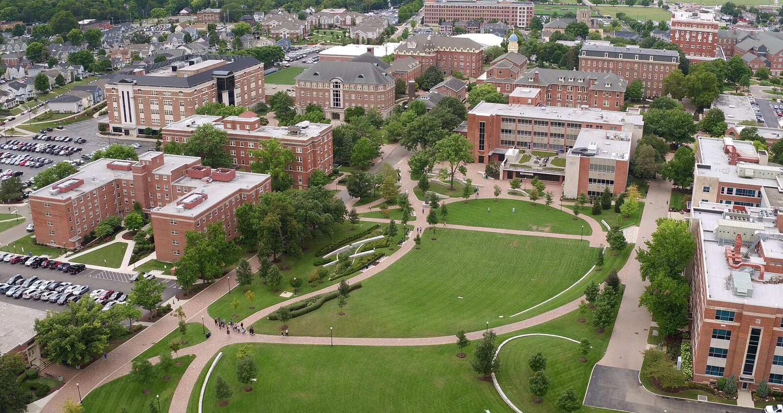 Seven acres of green space make up the Central Mall at the University of Dayton.   TY GREENLEES / STAFF