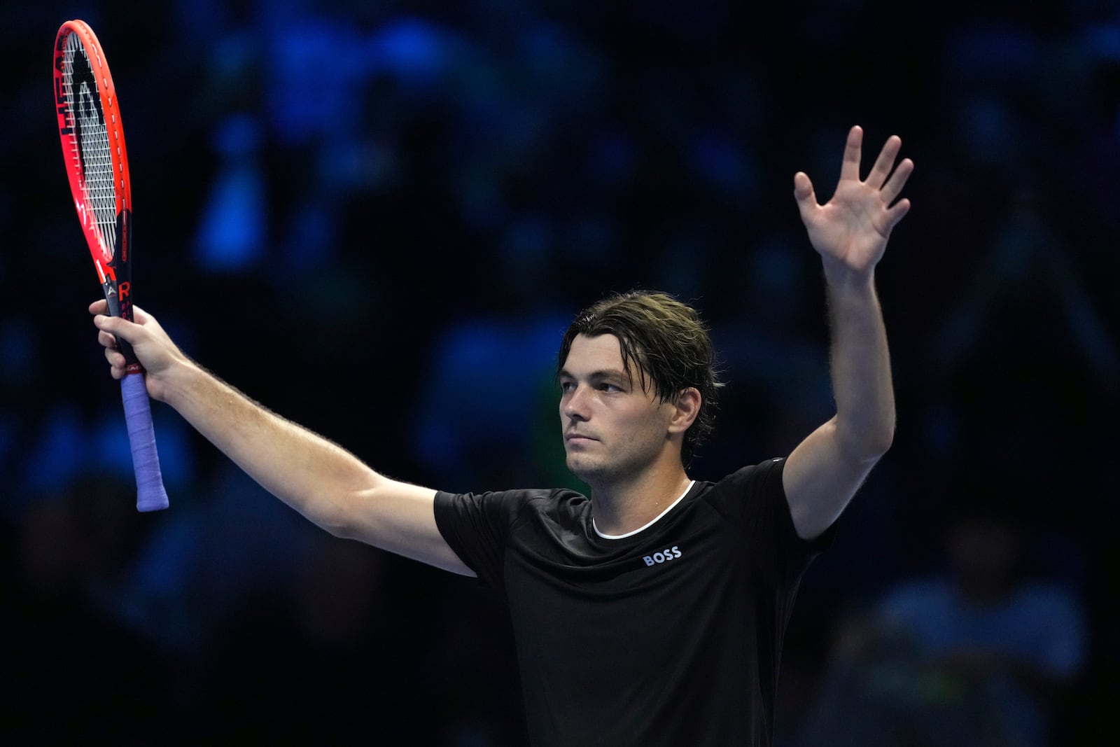 United States' Taylor Fritz celebrates after winning against Russia's Daniil Medvedev the singles tennis match of the ATP World Tour Finals at the Inalpi Arena, in Turin, Italy, Sunday, Nov. 10, 2024. (AP Photo/Antonio Calanni)