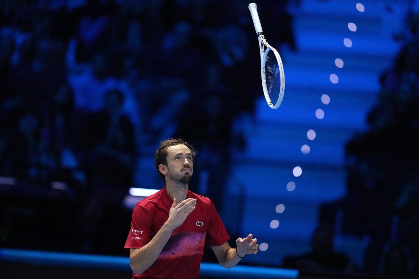 Russia's Daniil Medvedev reacts during the singles tennis match of the ATP World Tour Finals against United States' Taylor Fritz, at the Inalpi Arena, in Turin, Italy, Sunday, Nov. 10, 2024. (AP Photo/Antonio Calanni)