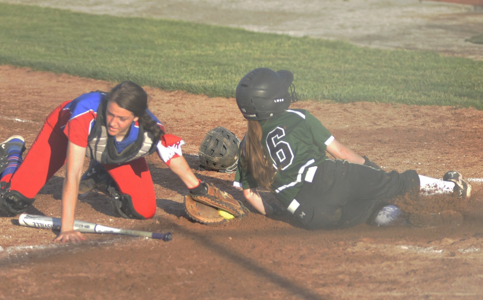 Carroll catcher Lydia Hughes tags out Greenville’s Courtney Bryson. Greenville defeated Carroll 7-1 in a D-II sectional final at Tipp City on Tue., May 15, 2018. MARC PENDLETON / STAFF