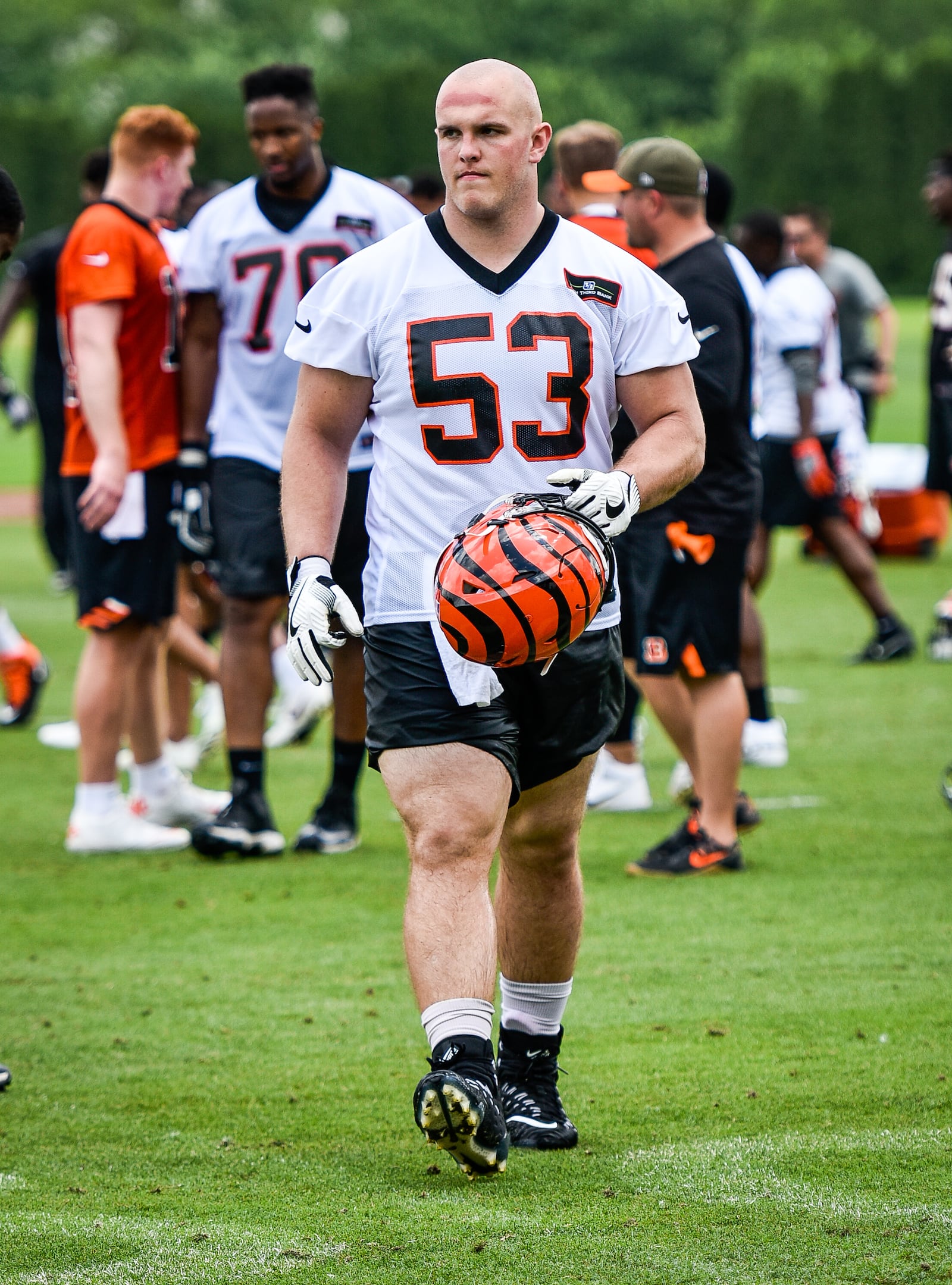 Bengals' rookie center Billy Price walks on the field during organized team activities Tuesday, May 22 at the practice facility near Paul Brown Stadium in Cincinnati. NICK GRAHAM/STAFF