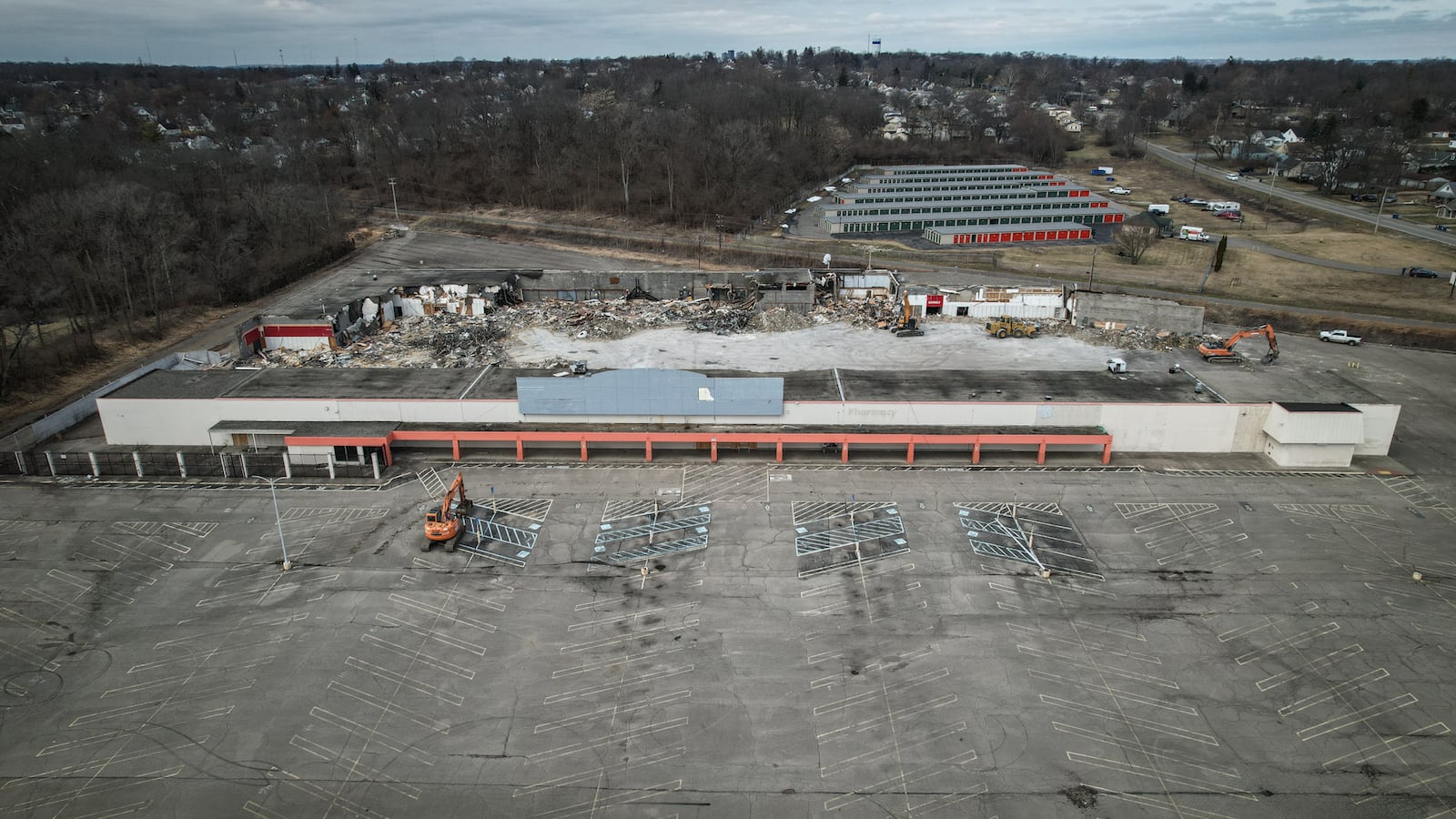 Crews Thursday were tearing the site of a former Kmart at Woodman Drive and Burkhardt Road where officials have said Kroger plans a $23 million location that will include about 160 jobs.