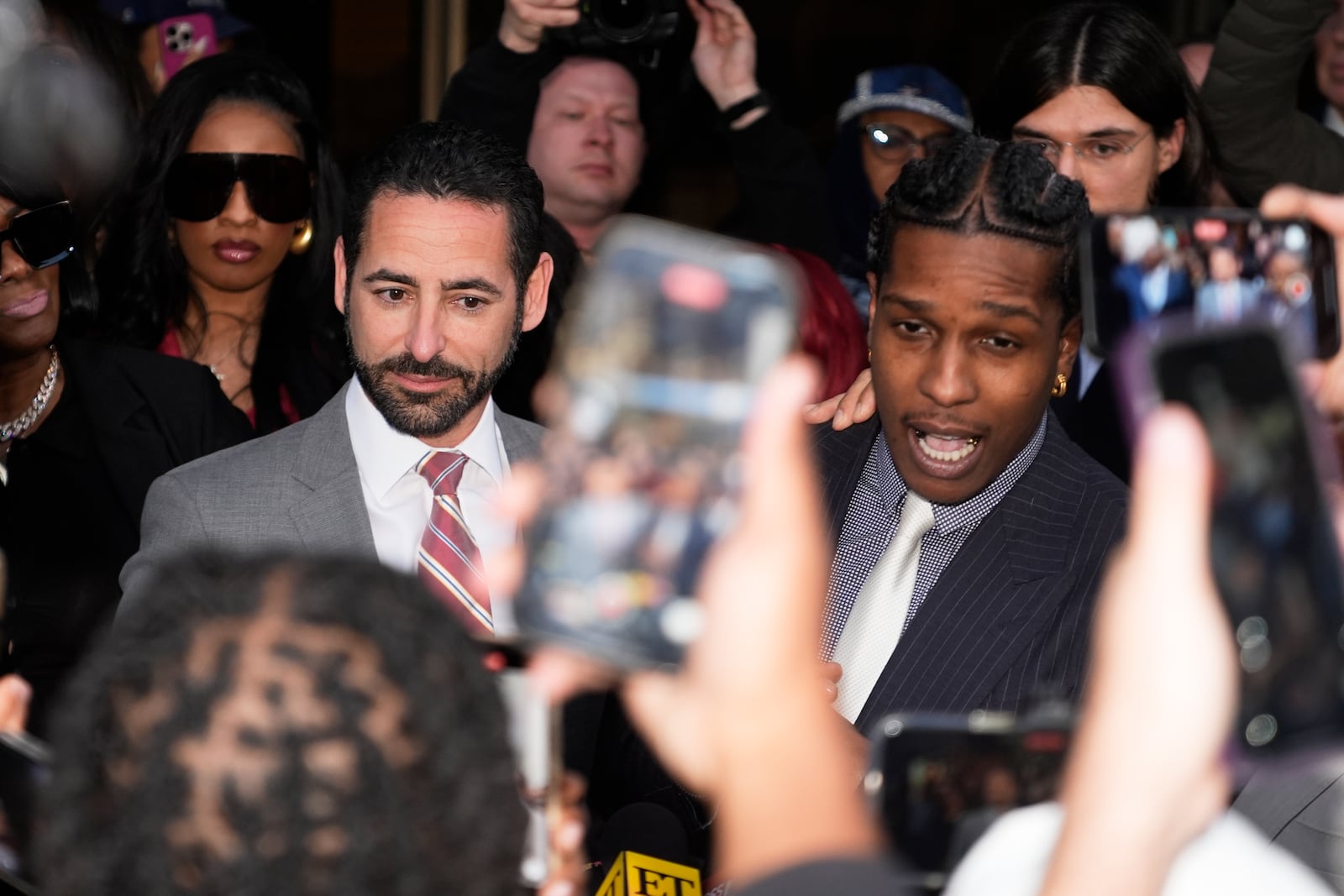 A$AP Rocky, right, speaks next to attorney Chad Seigel after he was found not guilty in his trial Tuesday, Feb. 18, 2025, in Los Angeles. (AP Photo/Damian Dovarganes)