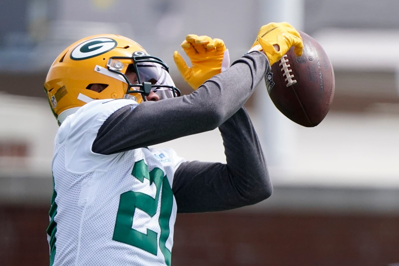 Green Bay Packers' Danny Davis runs a drill at the NFL football team's practice field training camp Tuesday, May 24, 2022, in Green Bay, Wis. (AP Photo/Morry Gash)