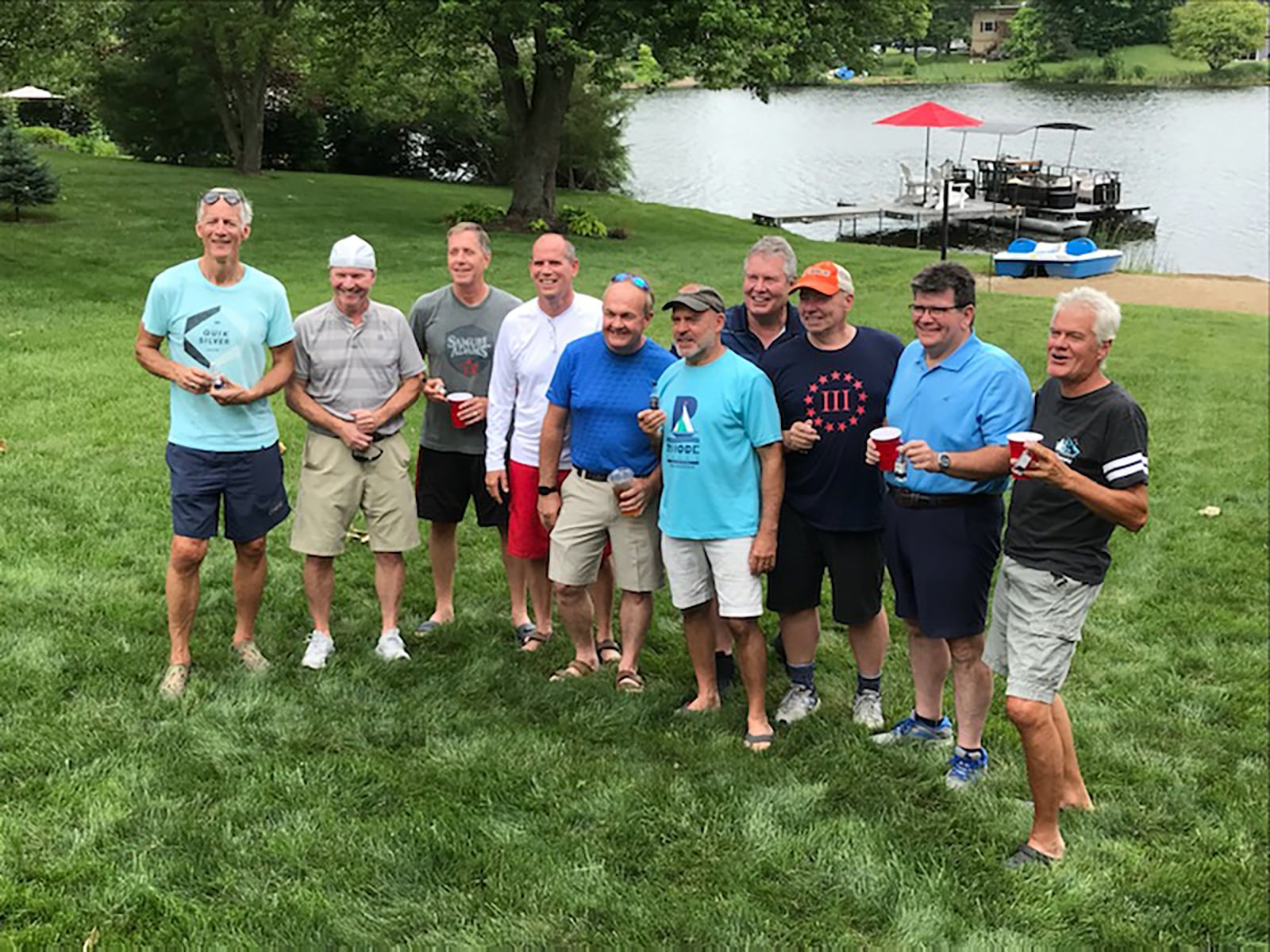 “The Boys” at their 60th Birthday Bash at Lake Lakengren in Eaton 2021.  From left, David Leary, Frank McBride, Gregg Gorsuch, Rick Fullenkamp, Brad Chamberlain, Bohac, Tim Tuuri, John Kleinhenz, Jay Doster, Joe Corbitt. The group now gets together every summer at the lake. CONTRIBUTED