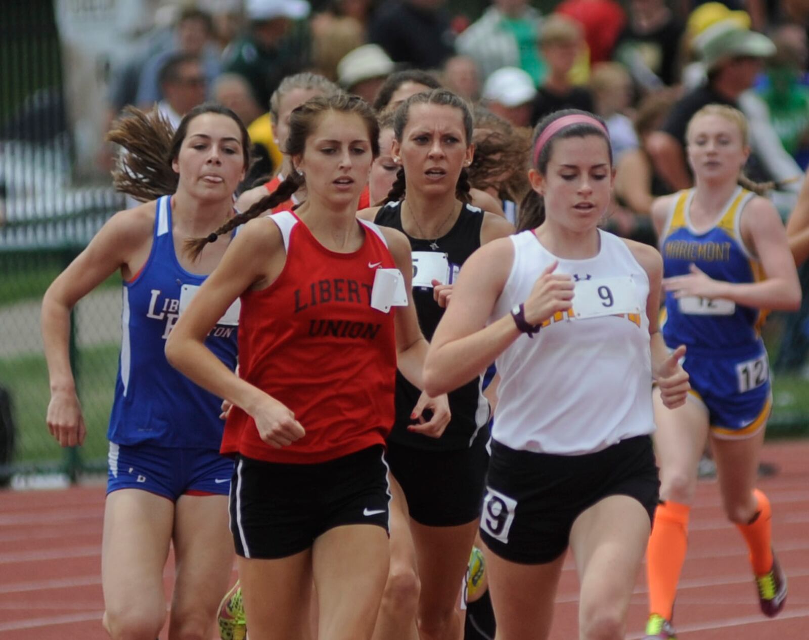 Alter senior Abby Nichols (right) won the 1,600 during the Division II state track and field meet at OSU's Jesse Owens Memorial Stadium on Saturday, June 4, 2016. MARC PENDLETON / STAFF