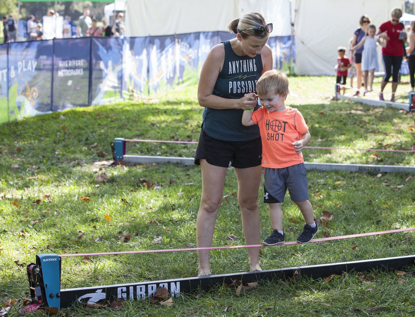 Give slacklining a try during The Urban Outdoor Experience at RiverScape MetroPark. CONTRIBUTED