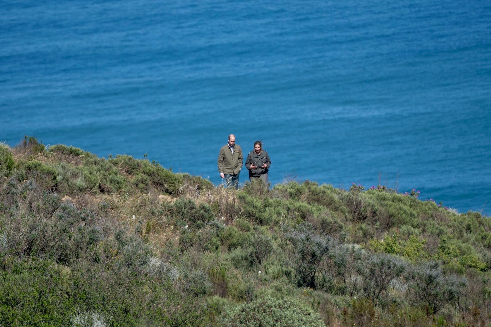 Britain's Prince William walks up Signal Hill with Park Manager for Table Mountain National Park Megan Taplin in Cape Town, South Africa, Tuesday, Nov. 5, 2024. (AP Photo/Jerome Delay, Pool)