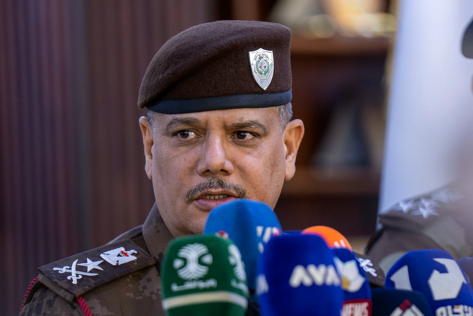 Gen. Mohammad Abd al-Wahhab Sukar Commander of Iraq's Border Forces, speaks at a press conference in Baghdad, Iraq, Monday, Dec. 2, 2024. (AP Photo/Hadi Mizban)