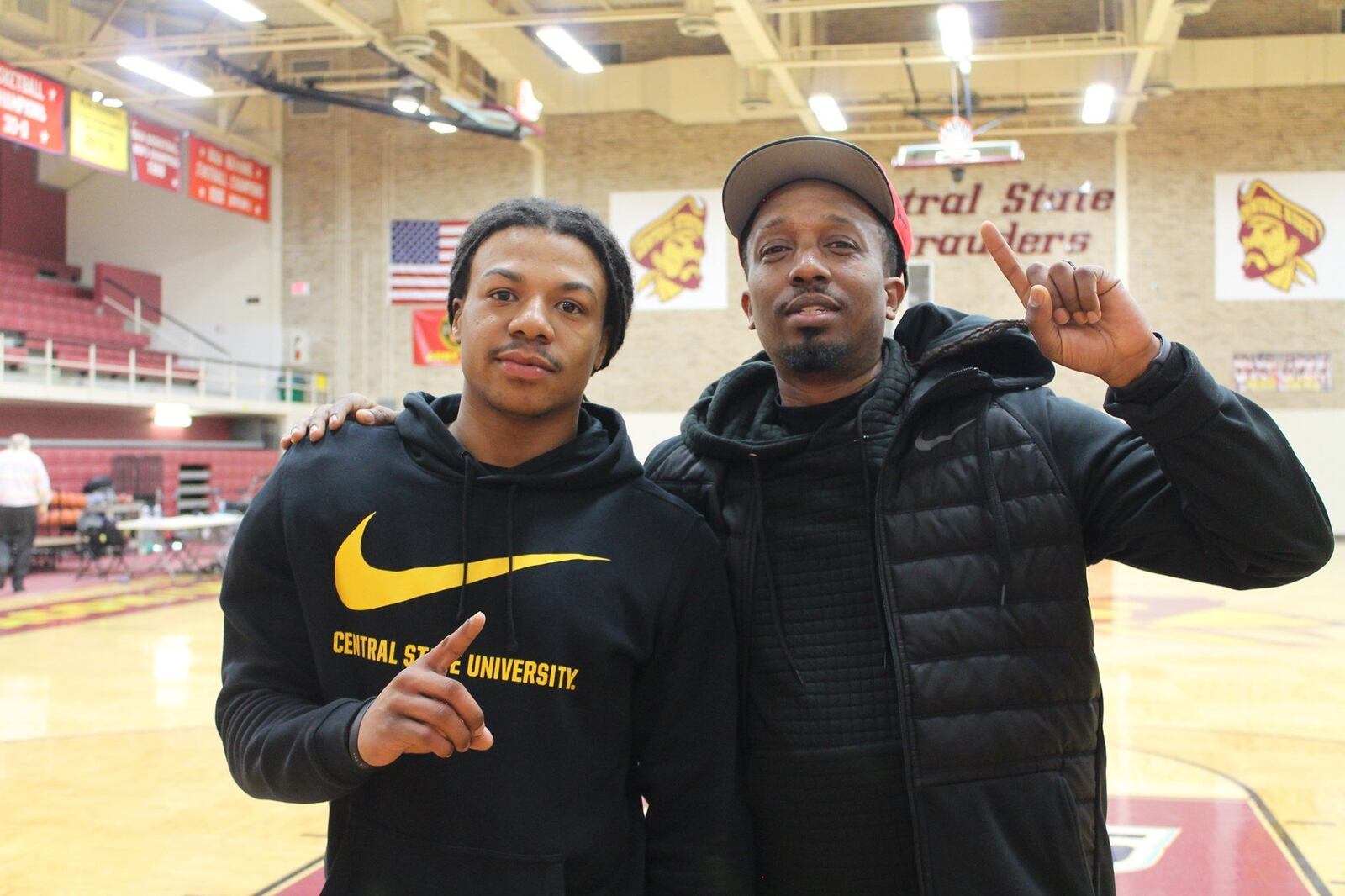 Central State’s Harris Brown (left) with high school coach Mosi Barnes. Central State Athletics photo