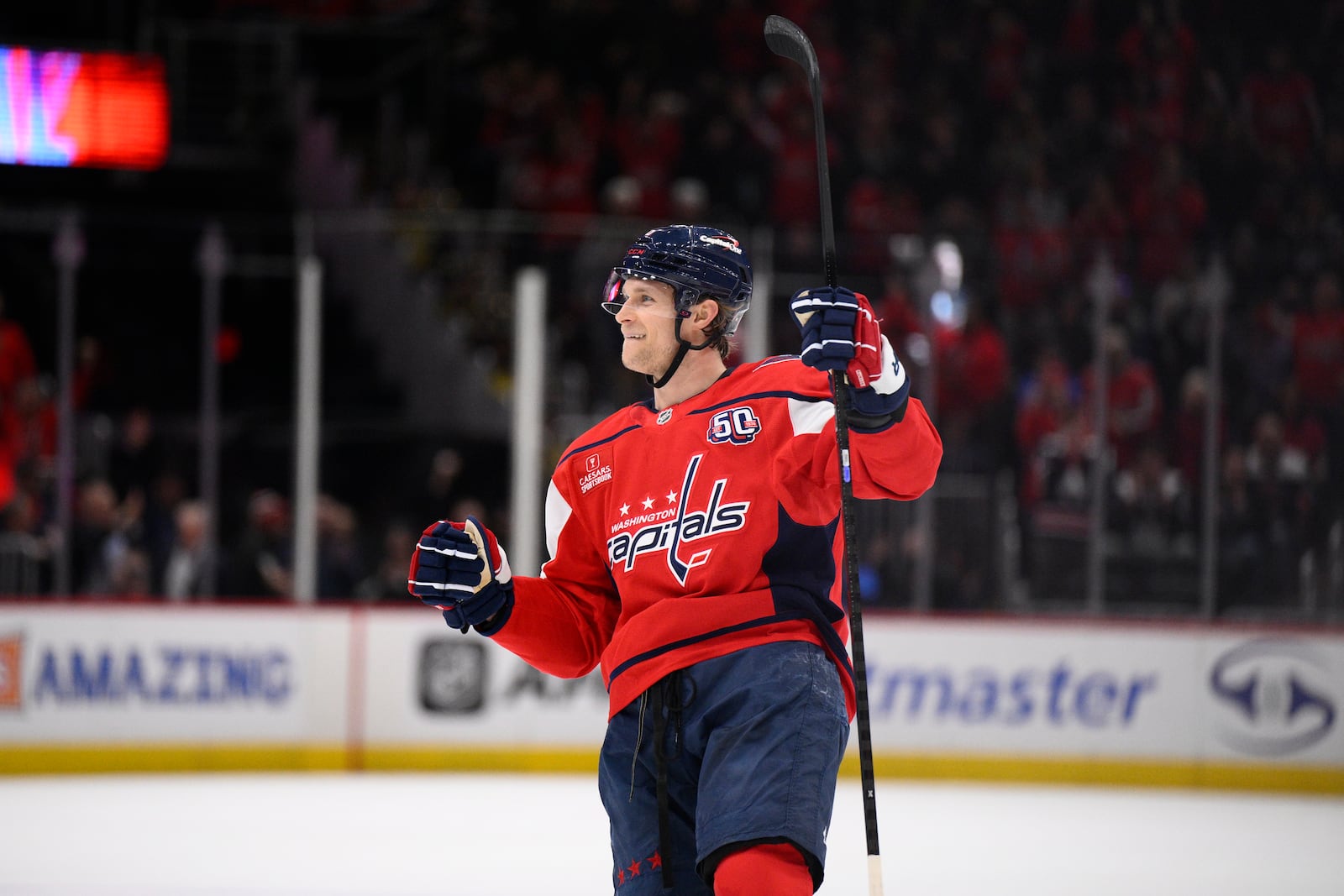 Washington Capitals defenseman Jakob Chychrun celebrates after his goal during the first period of an NHL hockey game against the Edmonton Oilers, Sunday, Feb. 23, 2025, in Washington. (AP Photo/Nick Wass)