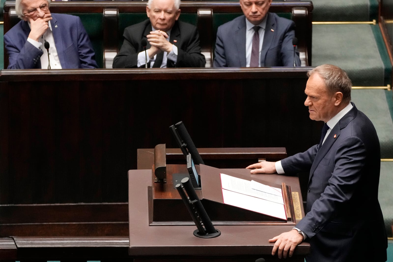 Polish Prime Minister Donald Tusk speaks at the Sejm, the lower house of parliament, in Warsaw, Poland, Friday March 7, 2025. (AP Photo/Czarek Sokolowski)