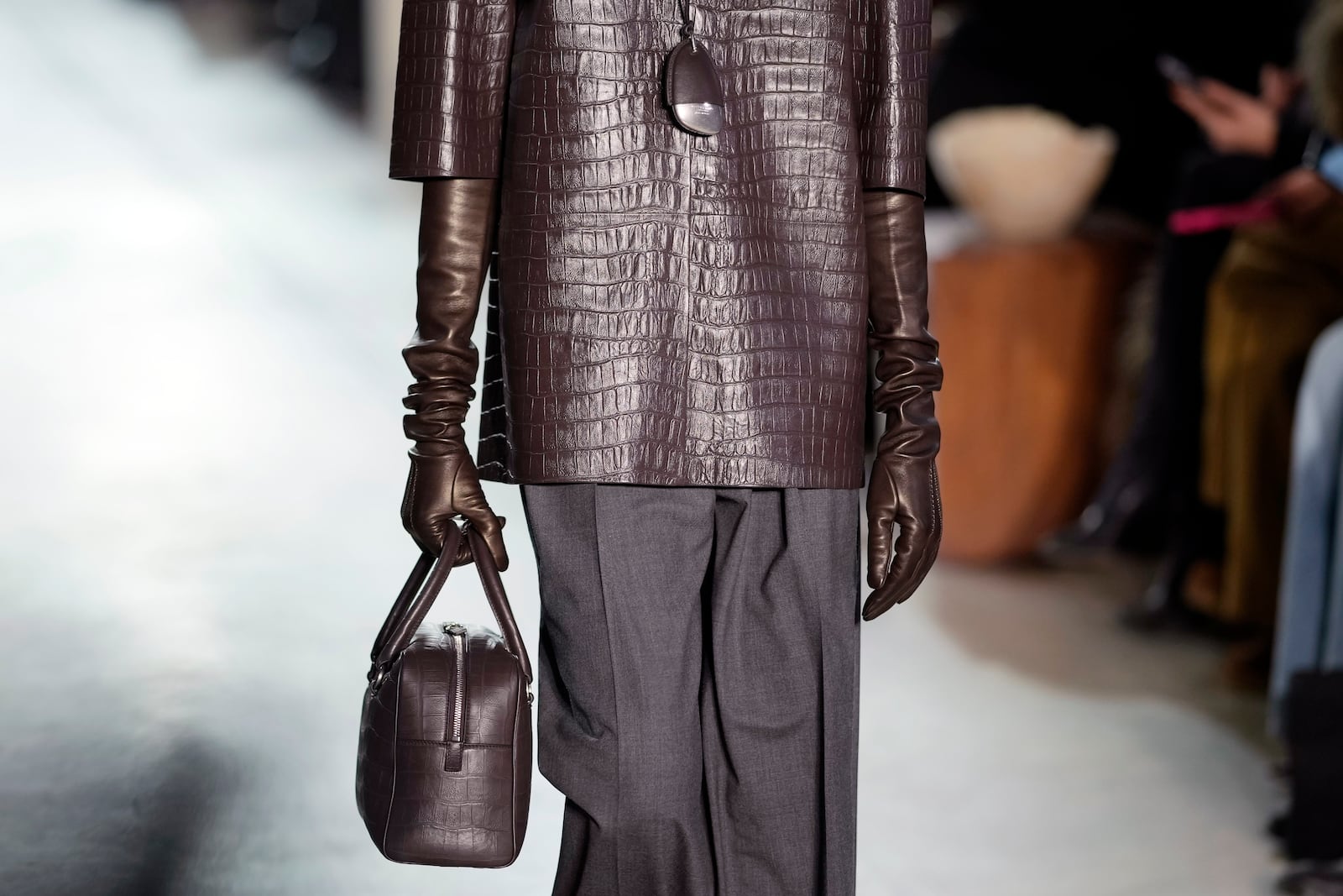 A model walks the runway during the Michael Kors Fall/Winter 2025 fashion show as part of New York Fashion Week on Tuesday, Feb. 11, 2025, at Terminal Warehouse in New York. (Photo by Charles Sykes/Invision/AP)