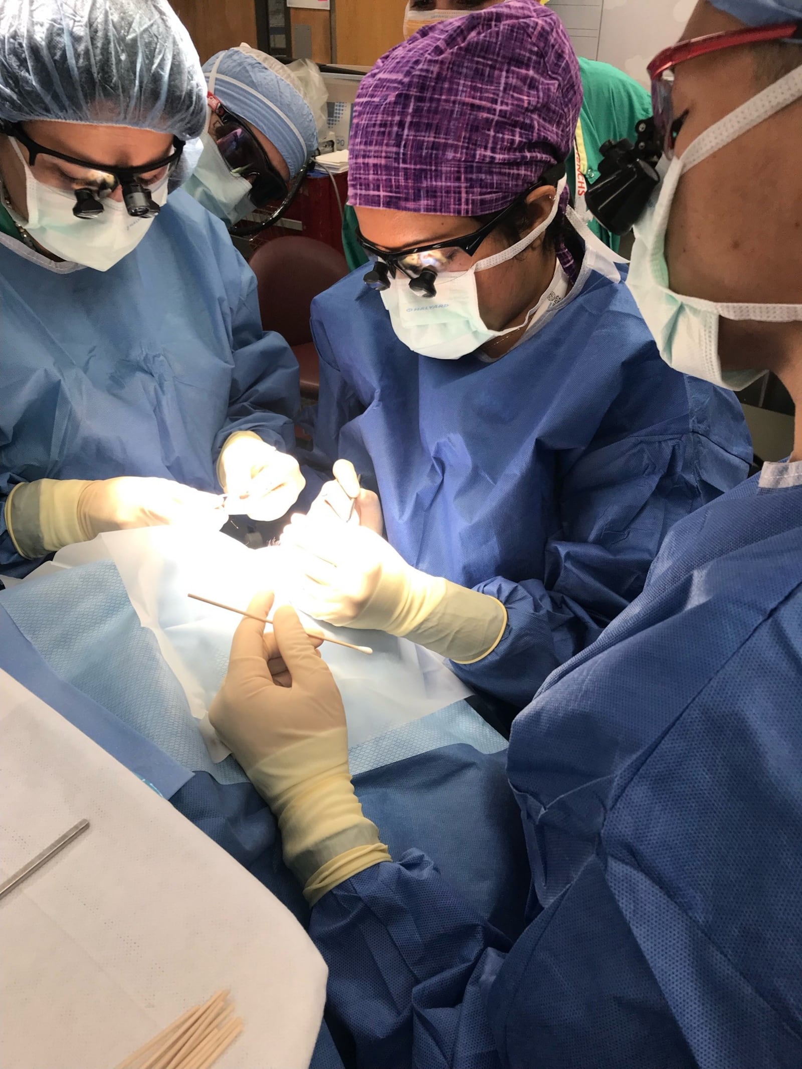 Dr. Luxme Hariharan (center) performing an eye surgery. CONTRIBUTED