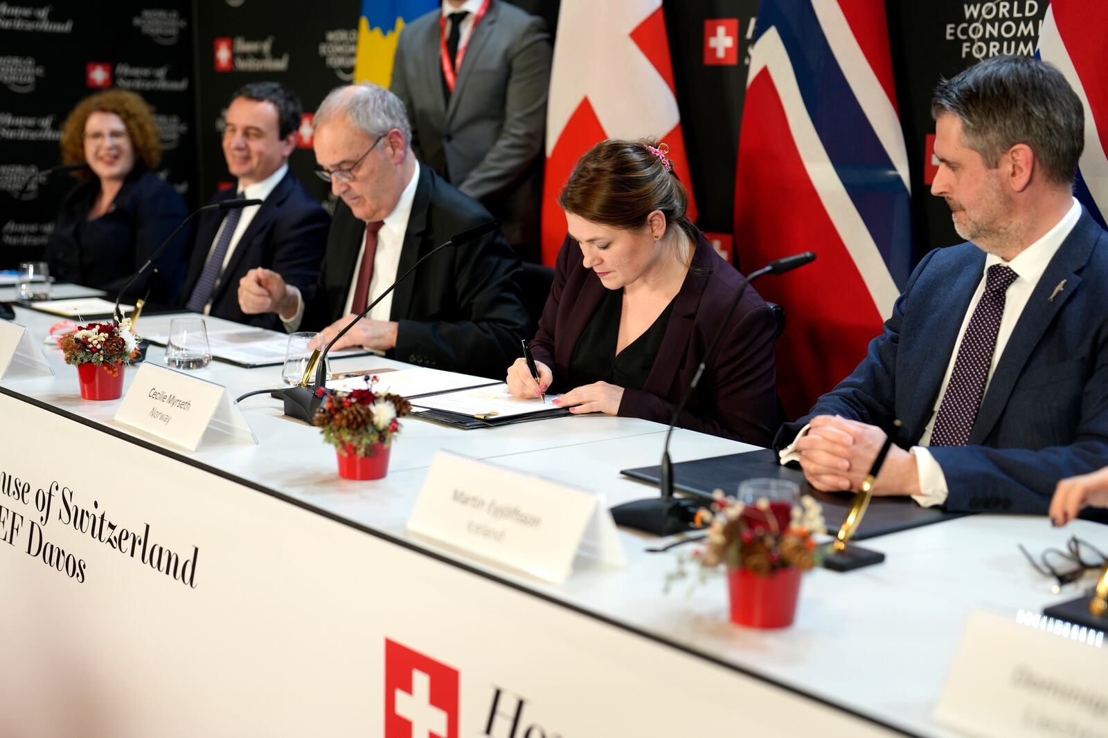 Trade and Industry Minister of Norway Cecilie Terese Myrseth, 2nd right, sign an EFTA Free Trade Agreement at the Annual Meeting of World Economic Forum in Davos, Switzerland, Wednesday, Jan. 22, 2025. (AP Photo/Markus Schreiber)