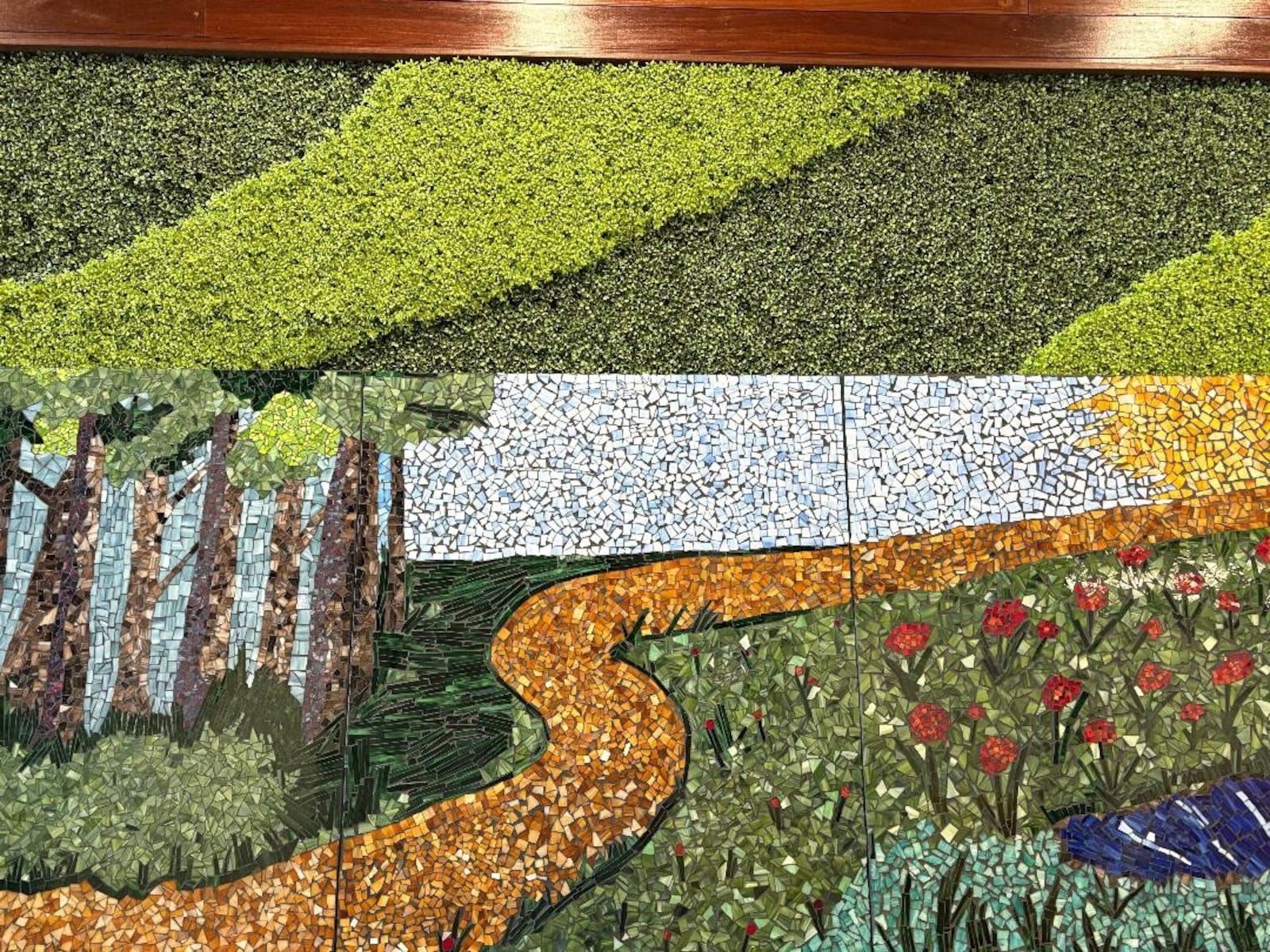 "The Path to Recovery" is a three-panel mosaic collaboration between the Mosaic Institute of Dayton and OneFifteen. Photo by Russell Florence Jr.