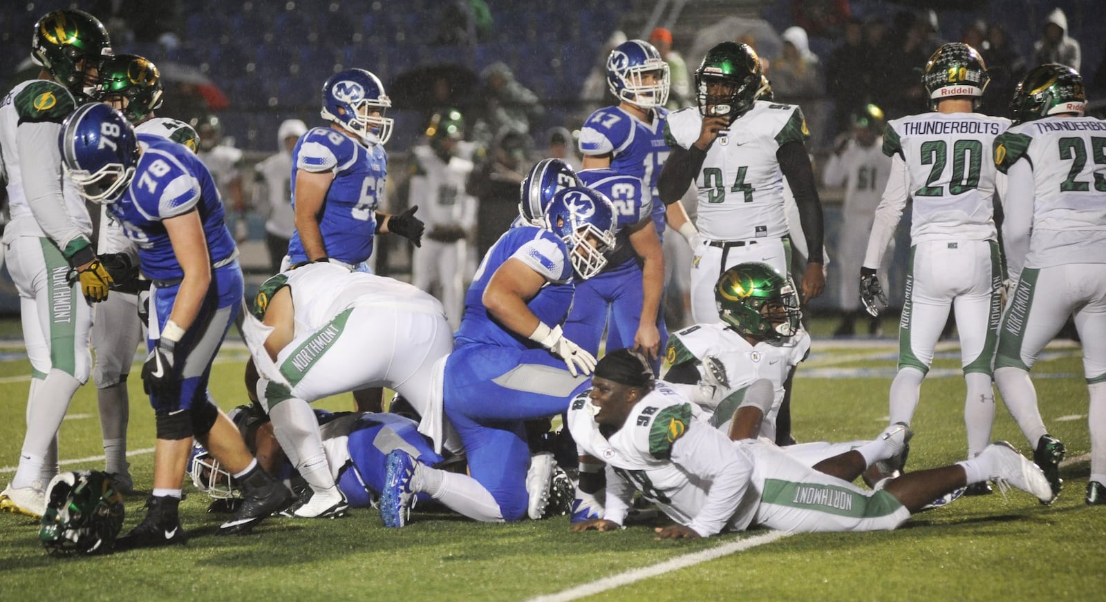 Northmont’s Jamar Walder (front) loses his helmet. Northmont defeated host Miamisburg 21-6 in a Week 10 high school football game on Friday, Oct. 26, 2018. MARC PENDLETON / STAFF