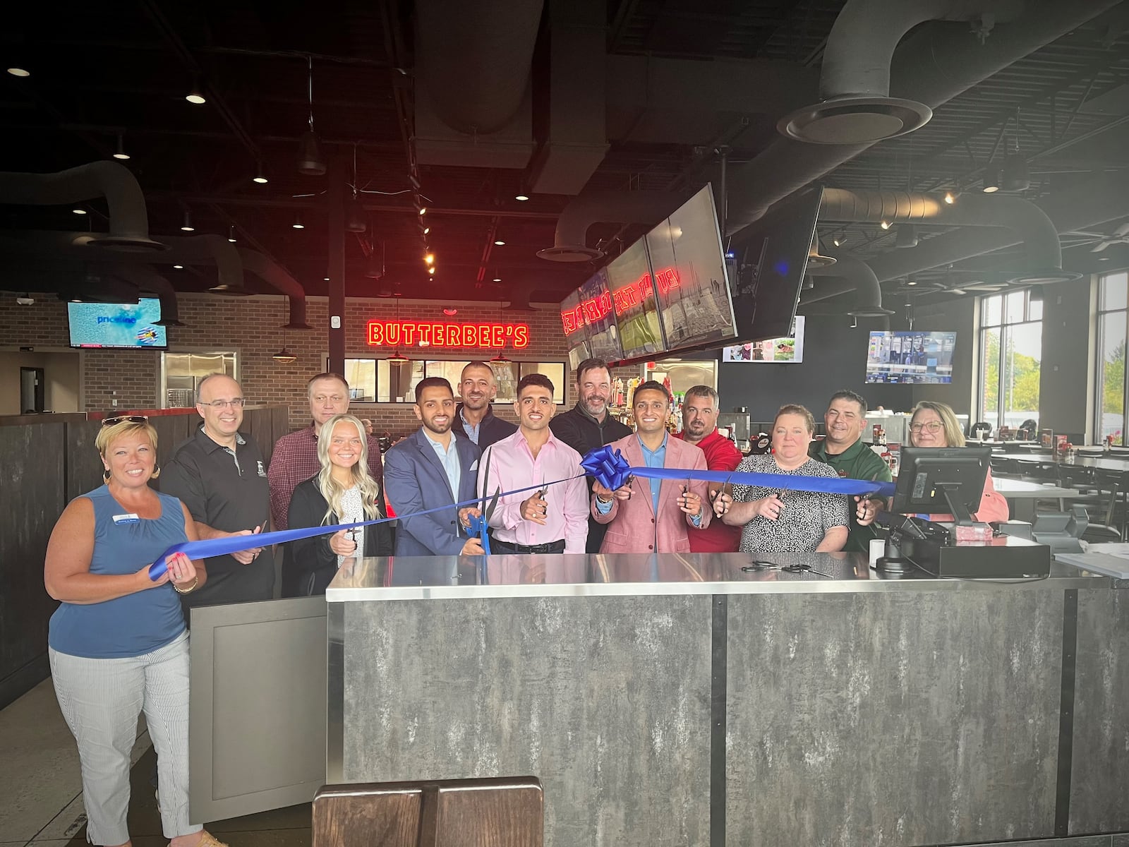 Butterbee’s American Grille, a family friendly, sports-themed restaurant and bar, is open in Xenia next door to Skyline Chili on Progress Drive. On Tuesday, Sept. 17 the Xenia Area Chamber of Commerce held a ribbon cutting. NATALIE JONES/STAFF