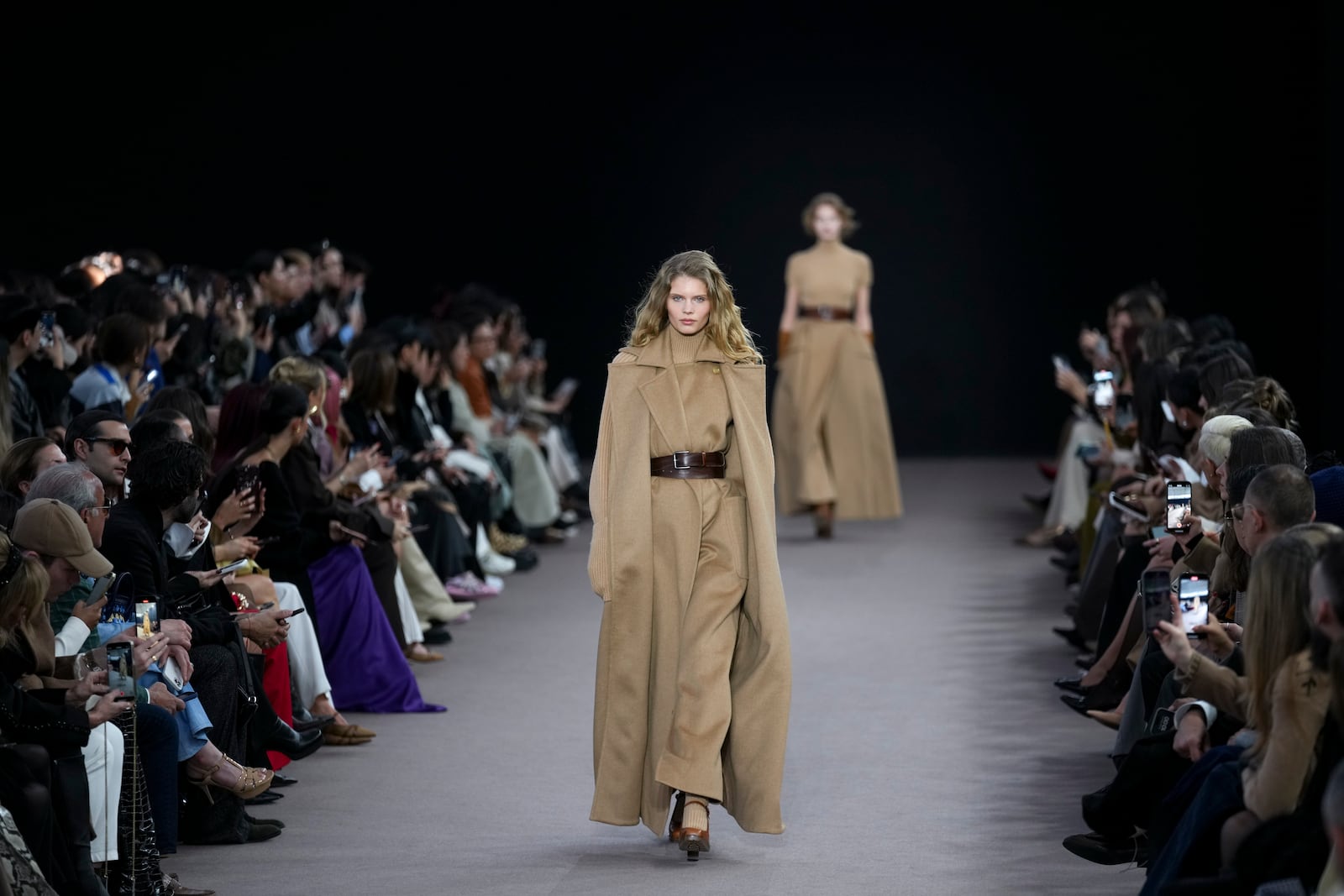 A model wears a creation as part of the Max Mara Fall/Winter 2025-2026 Womenswear collection presented in Milan, Italy, Thursday, Feb. 27, 2025. (AP Photo/Antonio Calanni)