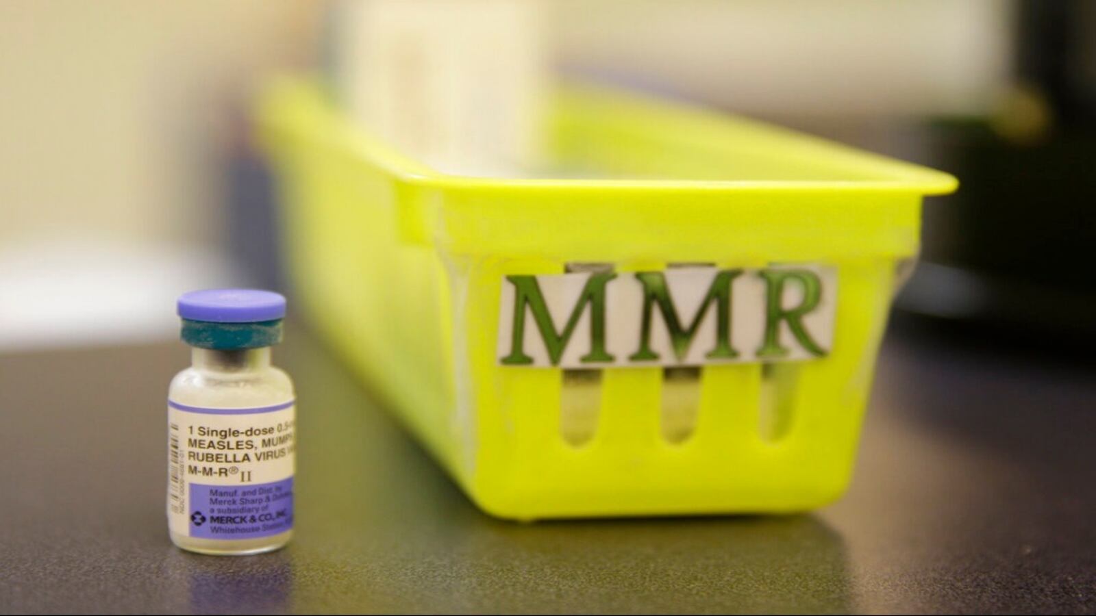 FILE - This Feb. 6, 2015, file photo, shows a measles, mumps and rubella vaccine on a countertop at a pediatrics clinic in Greenbrae, Calif. A measles outbreak near Portland has sickened dozens of people in Oregon and Washington, with several more cases suspected, and public health officials scrambling to contain the virus say low vaccination rates are making the situation worse. Clark County Public Health said Sunday, Jan. 28, 2019, that the majority of the cases involve children younger than 10. 