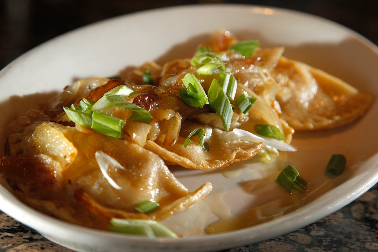 It's hard to find pierogis like these at The Amber Rose Restaurant and Catering in Dayton, but Forking Pierogi food truck's menu hints at coming close. The Columbus-based food truck will be in Dayton on Saturday, July 15. FILE