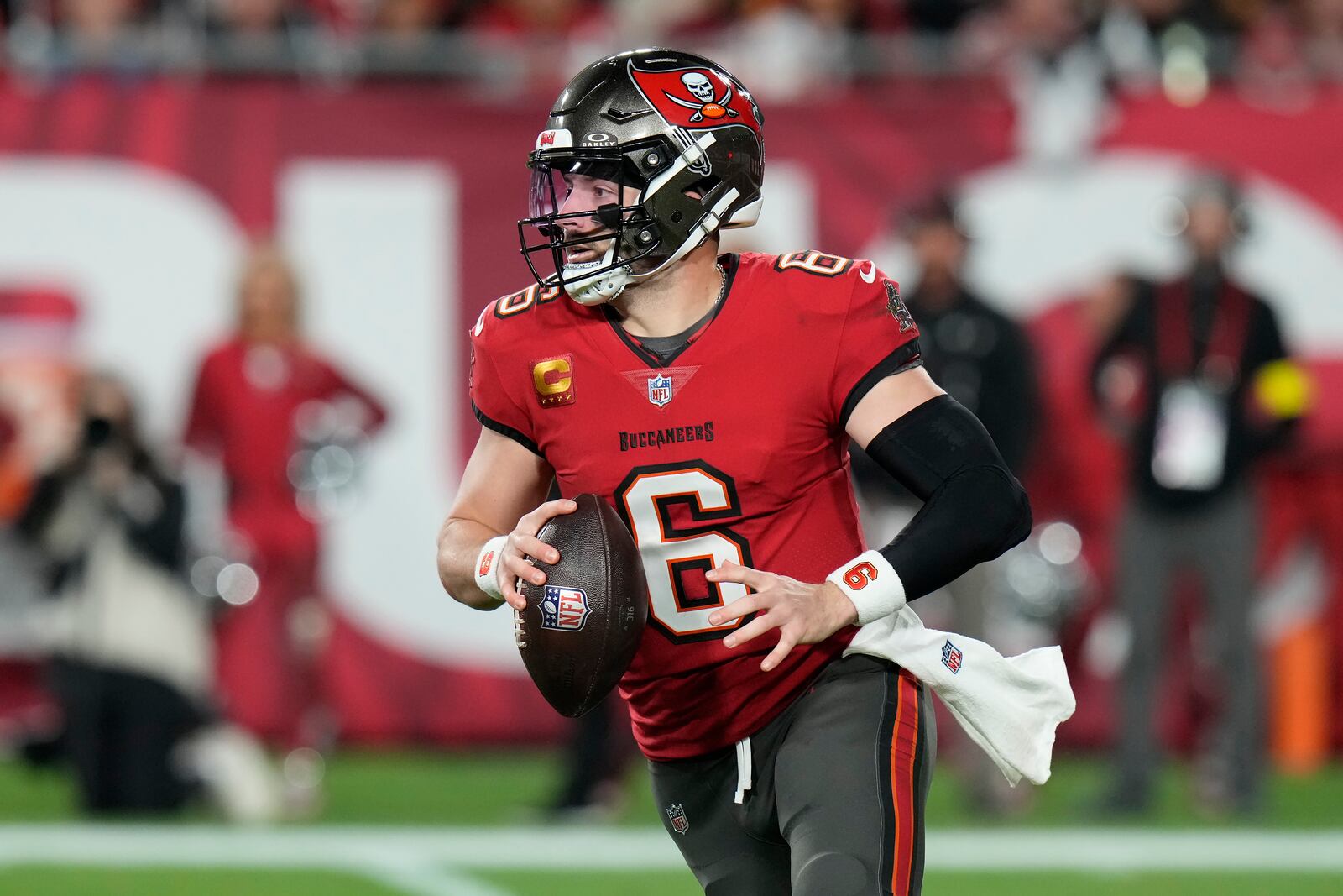 Tampa Bay Buccaneers quarterback Baker Mayfield (6) looks to pass against the Washington Commanders during the first half of an NFL wild-card playoff football game in Tampa, Fla., Sunday, Jan. 12, 2025. (AP Photo/Chris O'Meara)