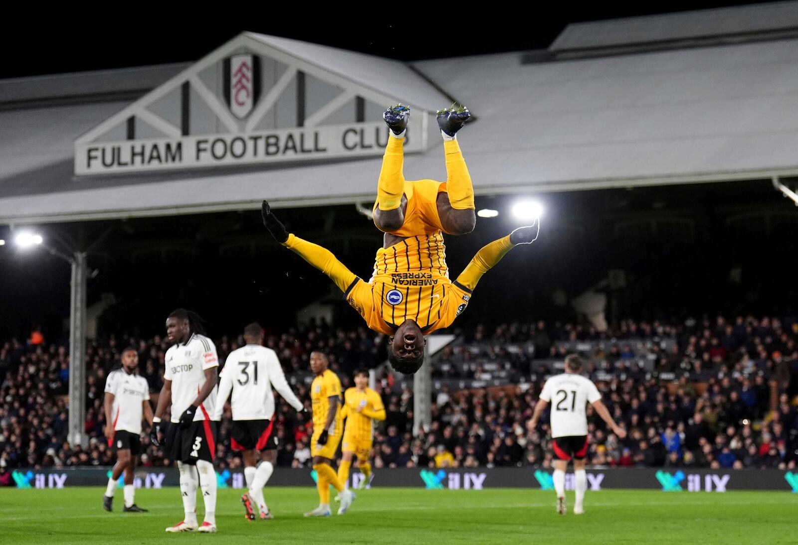 Brighton and Hove Albion's Carlos Baleba celebrates scoring his sides first goal during the English Premier League soccer match between FC Fulham and Brighton & Hove Albion in London, England, Thursday, Dec. 5, 2024. ( John Walton/PA via AP)