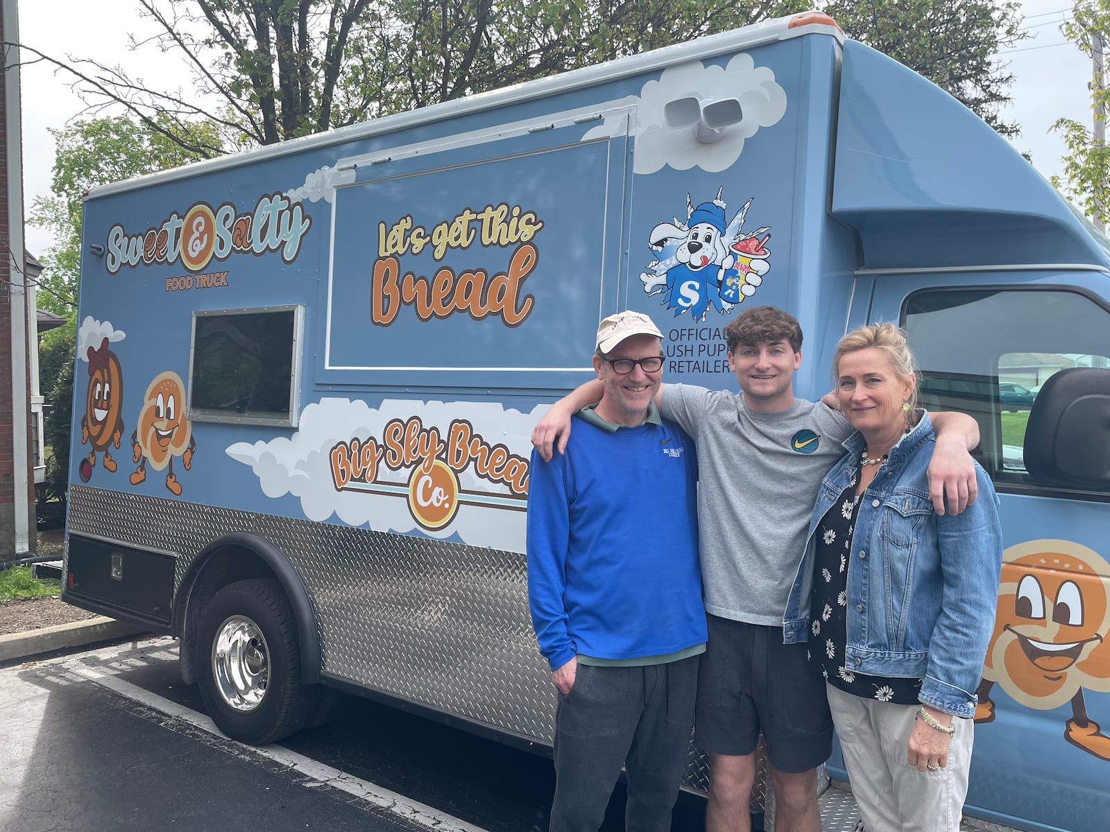 Big Sky Bread Company, a longtime Kettering bakery known for its pizza bread, pretzels and cinnamon rolls is going on wheels. Pictured left to right is Philip, Max and Mari Gallenstein. NATALIE JONES/STAFF