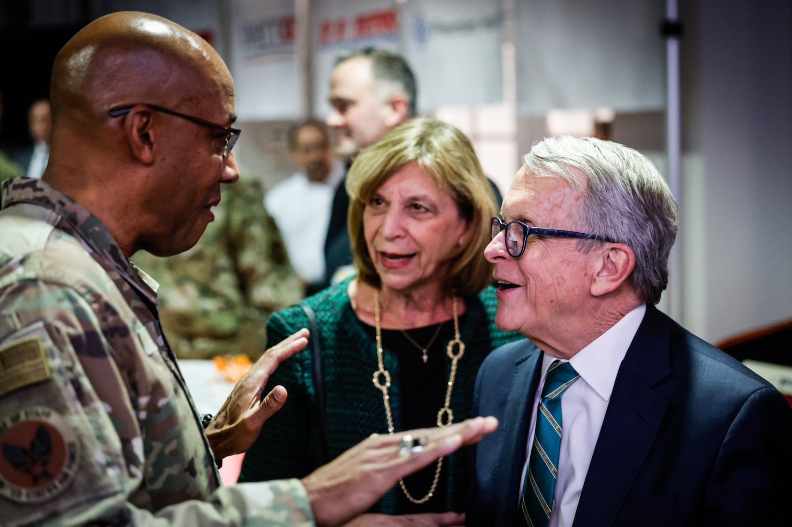 Gen. Charles Q. Brown Jr., left, talks with Ohio Gov. Mike DeWine and Fran DeWine at the HOOPLA Celebration and the 75th Anniversary of the Air Force at Carrillon Park. Jim Noelker/Staff