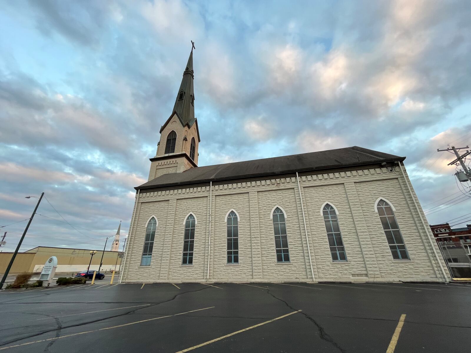 Weyland Ventures, a Kentucky-based developer, wants to turn St. Paul Evangelical Lutheran Church and parish hall at 239 Wayne Ave. in the Oregon District into a new boutique hotel and possibly a restaurant and event space. The developer proposes building a new, three-story hotel building just north of the church. CORNELIUS FROLIK / STAFF