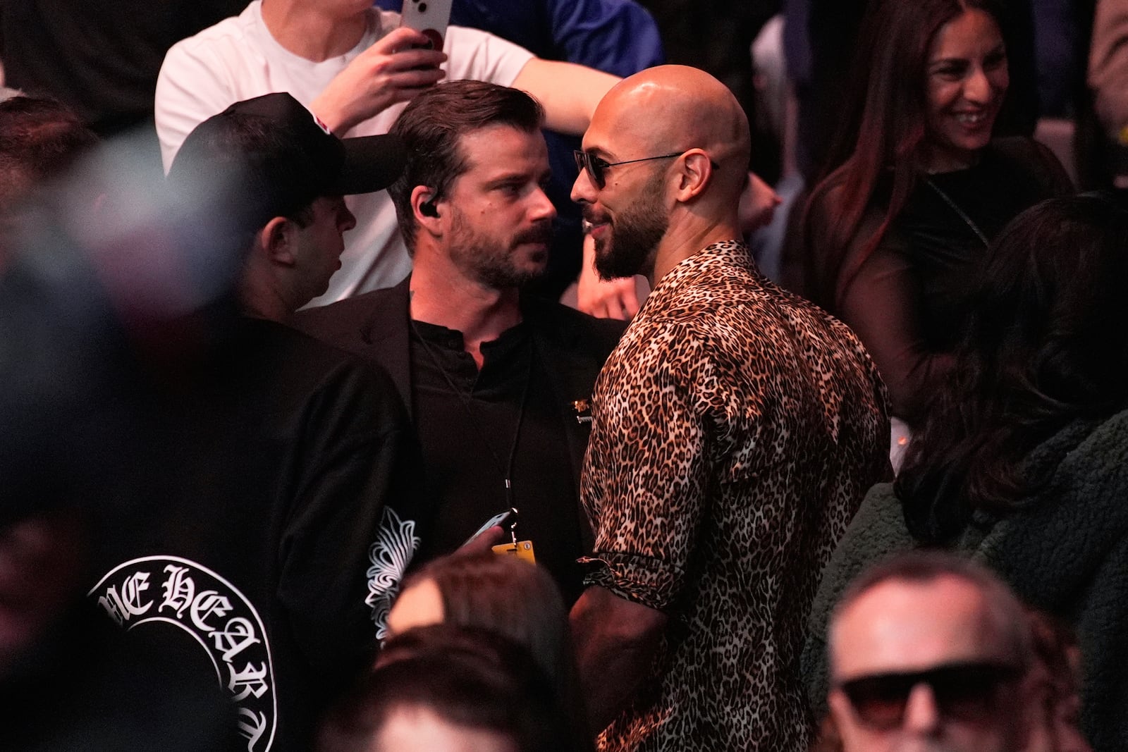 Andrew Tate attends a UFC 313 mixed martial arts event bout Saturday, March 8, 2025, in Las Vegas. (AP Photo/John Locher)