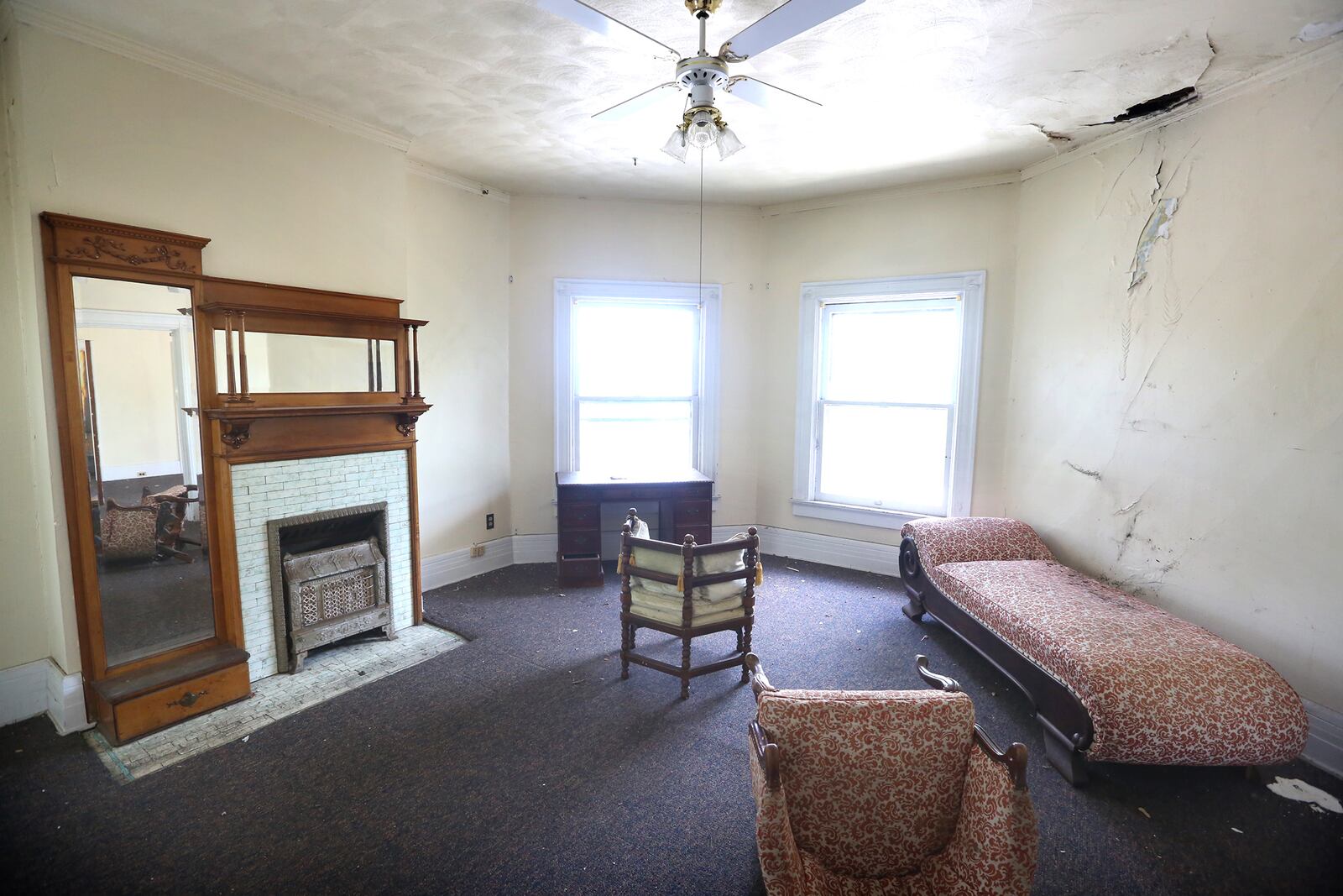 A historic home in the Dayton View Historic District known as the Cox Mansion will be given away to the right taker. This is a view of a bedroom on the second floor.  LISA POWELL / STAFF