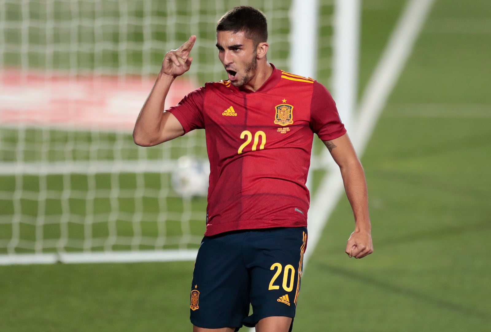 Spain's Ferran Torres celebrates after scoring his team's fourth goal during the UEFA Nations League soccer match between Spain and Ukraine at the Estadio Alfredo Di Stefano stadium in Madrid, Spain, Sunday, Sept. 6, 2020. (AP Photo/Bernat Armangue)