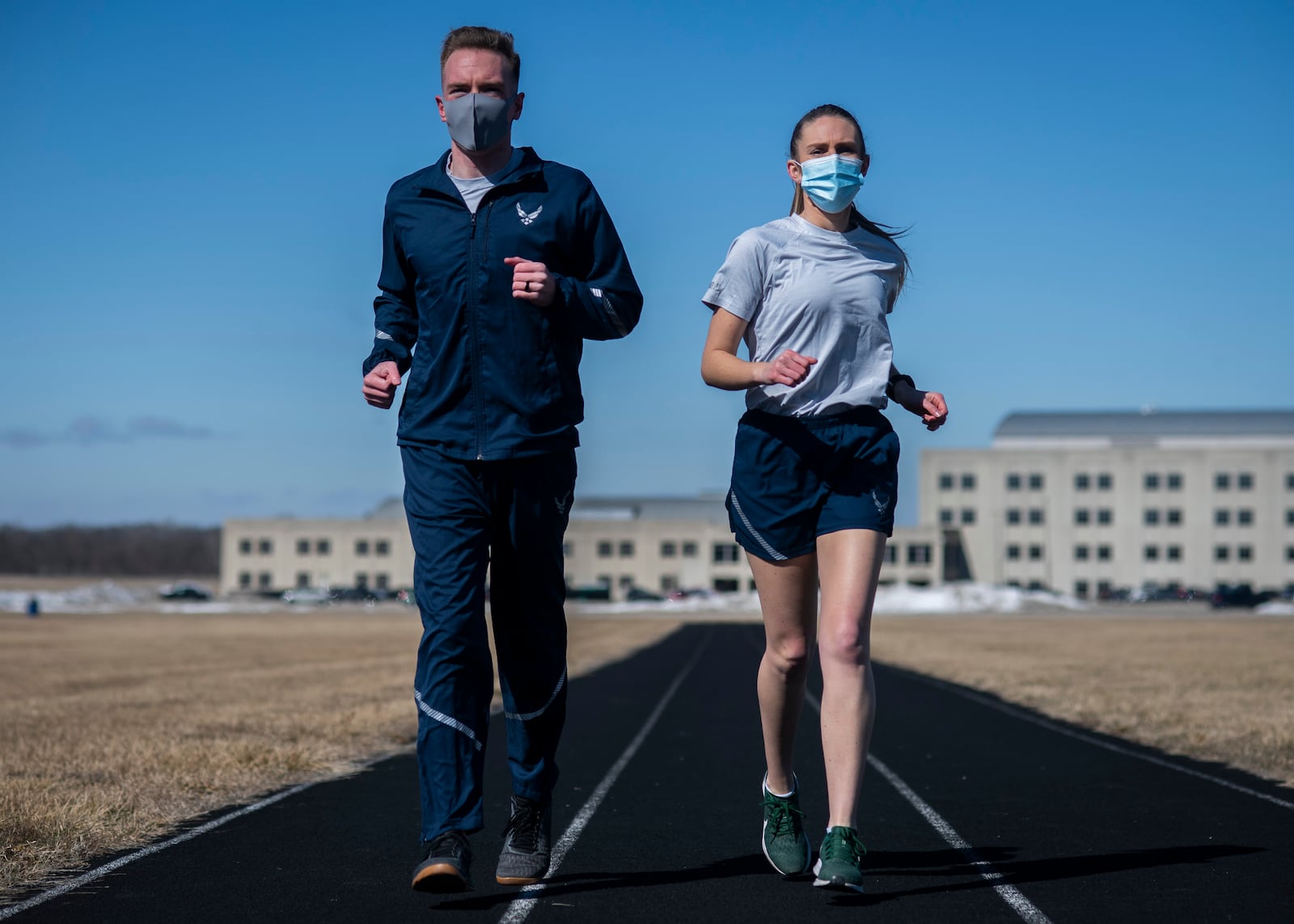 Air Force Uniform Office members 1st Lt. Avery Thompson and 2nd Lt. Maverick Wilhite put updated versions of the Air Force phyisical training (PT) uniform through their paces at Wright-Patterson Air Force Base. (U.S. Air Force photo by Jim Varhegyi)