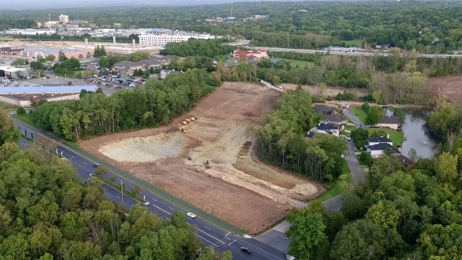 Site preparation for 14 new walk-up apartment buildings on Alex-Bell Road in Centerville continues for the Gateway Lofts development. 256 one-bedroom units and 104 two-bedroom units are planned for the nearly 40 acres site. TY GREENLEES / STAFF