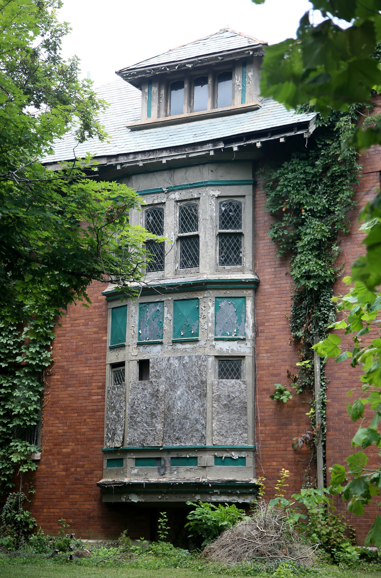 Preservation Dayton Inc., a Dayton non-profit, will attempt to stabilize 10 historic properties in Dayton with the hopes of finding an investor to rehabilitate each one. The Van Deman Apartments are on the list of Dayton's most endangered properties.  LISA POWELL / STAFF