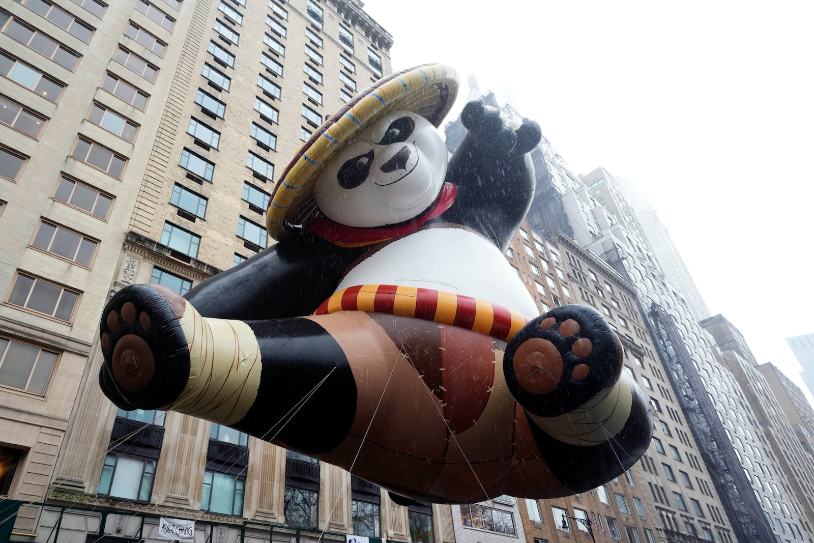 The Kung Fu Panda balloon floats in the Macy's Thanksgiving Day Parade on Thursday, Nov. 28, 2024, in New York. (Photo by Charles Sykes/Invision/AP)