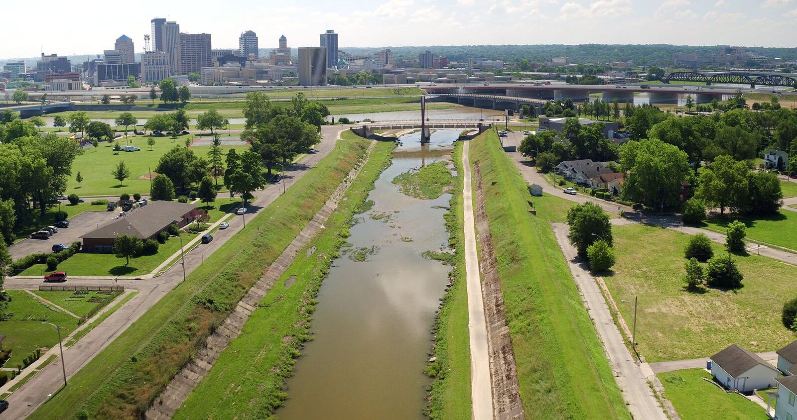 Wolf Creek looking east toward downtown Dayton. Five Rivers MetroParks has partnered with the city of Dayton and Miami Conservancy District to develop a comprehensive 20-year master plan for 12 miles of river corridor in greater downtown Dayton. The Downtown Dayton Riverfront Master Plan should be completed by summer 2018. TY GREENLEES / STAFF