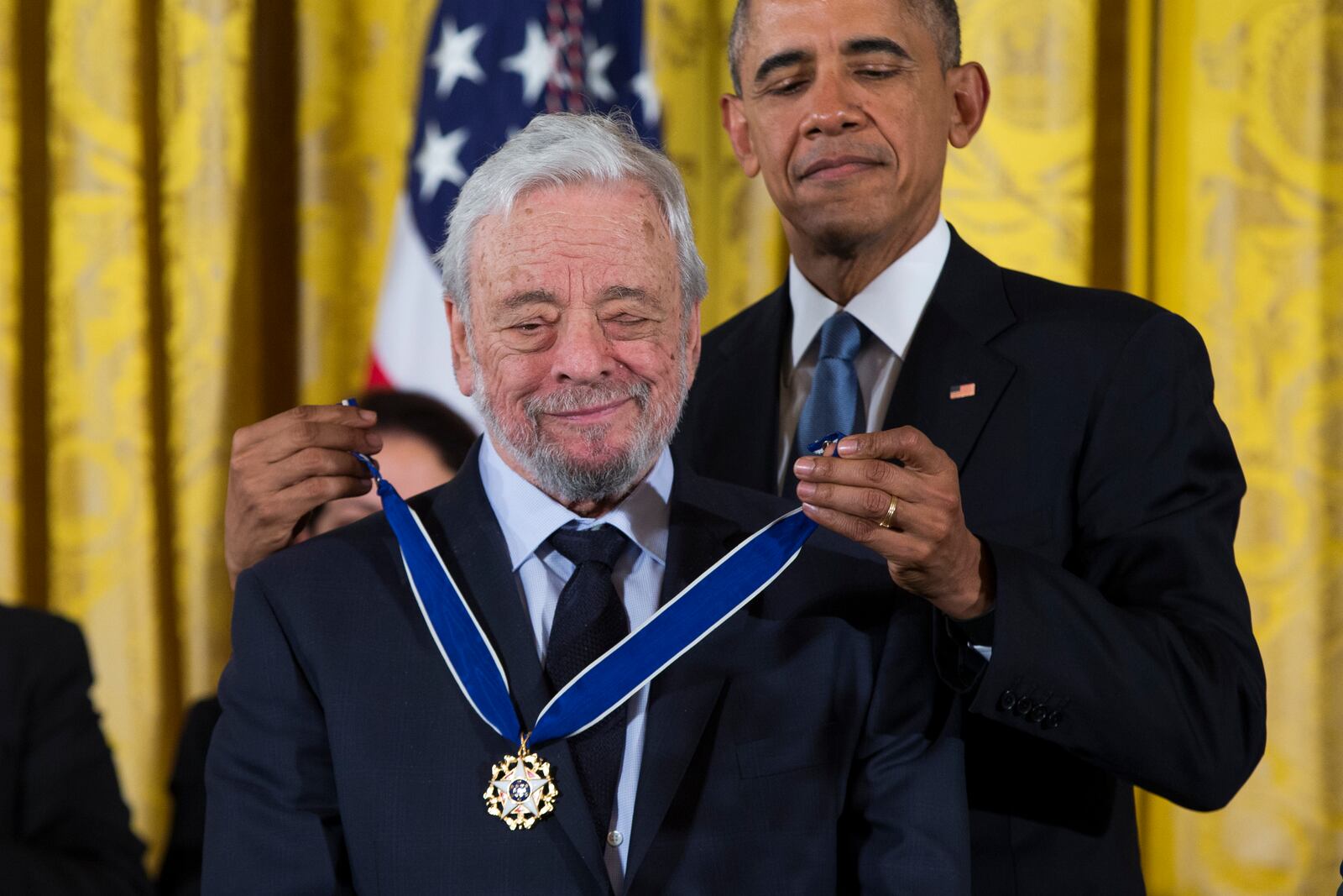 FILE - President Barack Obama, right, presents the Presidential Medal of Freedom to composer Stephen Sondheim during a ceremony in the East Room of the White House, on, Nov. 24, 2015, in Washington. Sondheim, the songwriter who reshaped the American musical theater in the second half of the 20th century, has died at age 91. Sondheim's death was announced by his Texas-based attorney, Rick Pappas, who told The New York Times the composer died Friday, Nov. 26, 2021, at his home in Roxbury, Conn. Pappas did not return calls and messages to The Associated Press. (AP Photo/Evan Vucci, File)