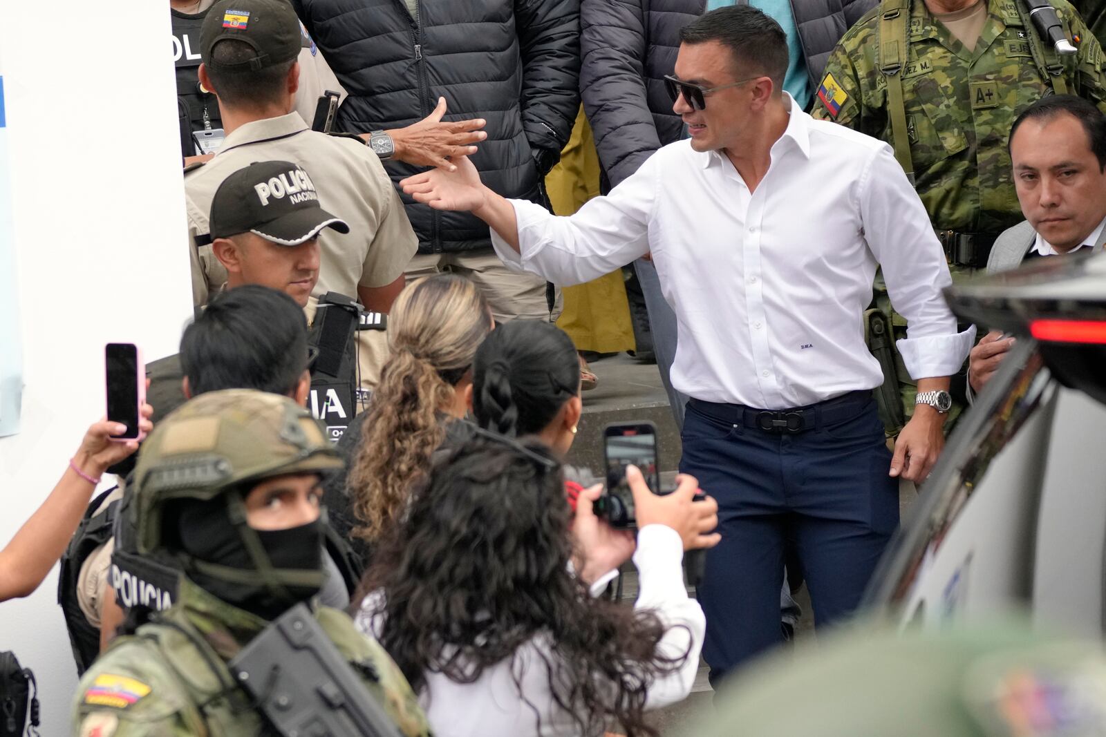 President Daniel Noboa, who is running for re-election, leaves a polling station in Quito, Ecuador, during presidential elections, Sunday, Feb. 9, 2025. (AP Photo/Dolores Ochoa)