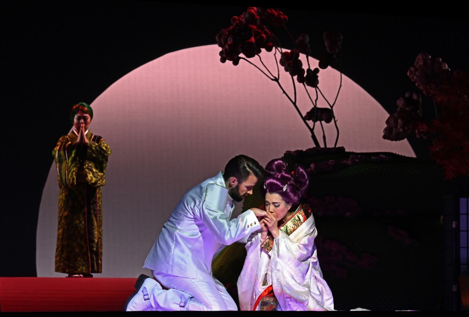 Nozomi Kato as Suzuki, Adam Smith as Pinkerton, and Karah Son as Cio-Cio-San in Cincinnati Opera’s 2023 production of Madame Butterfly. (CONTRIBUTED CREDIT: Philip Groshong)