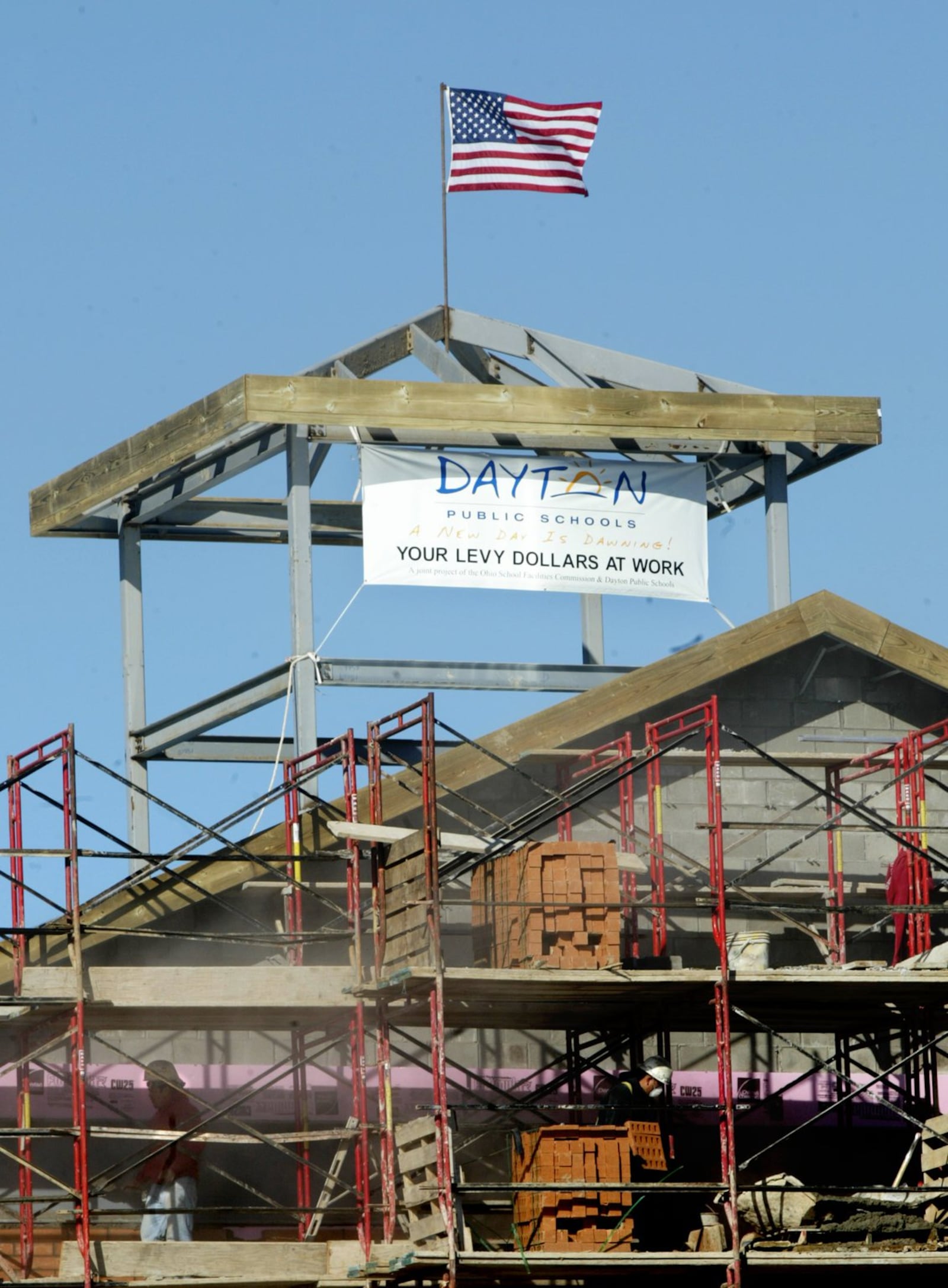 The final steel beam of the new Wogaman school on Germantown Street was hoisted into place in January 2006. Nearly 14 years later, Dayton Public Schools officials are weighing how much to spend for maintenance on their relatively new schools. PHOTO BY JAN UNDERWOOD