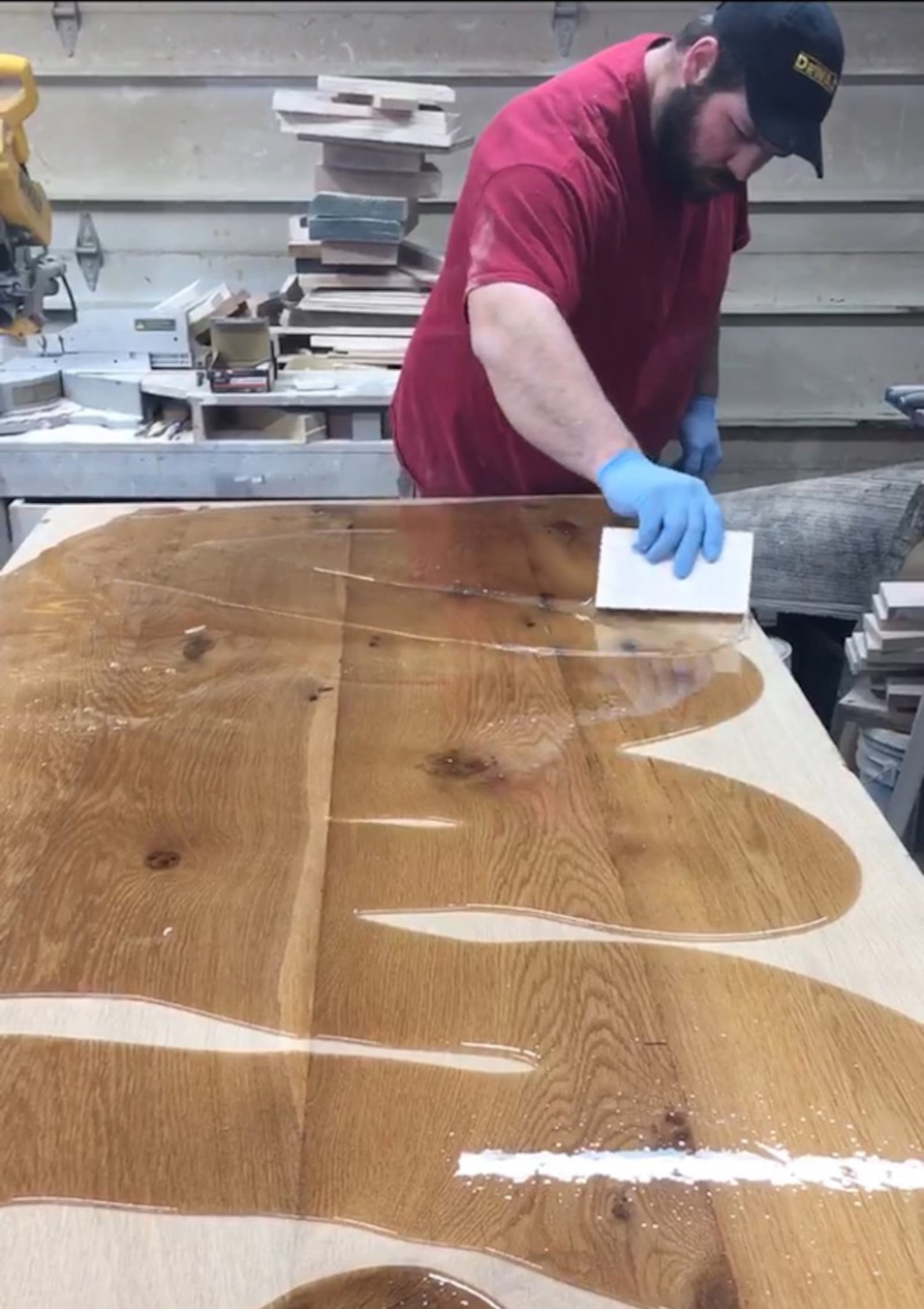 Cedarville alumnus from the class of 2013 Phil Kochsmeier works on the tables he was contracted to build for the university's new Chick-fil-A restaurant.