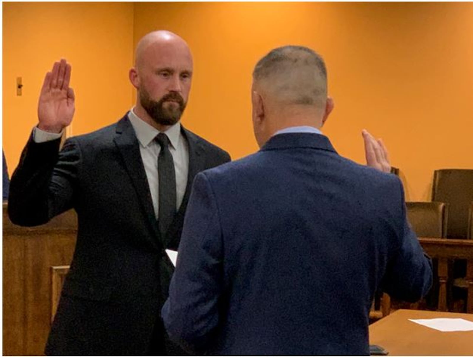 Mark Messer, left, takes the oath of office as the new mayor of Lebanon from City Attorney Mark Yurick during the reorganization meeting of Lebanon City Council. Messer has been a council member for the past 10 years with the last eight years as the city's vice mayor. ED RICHTER/STAFF