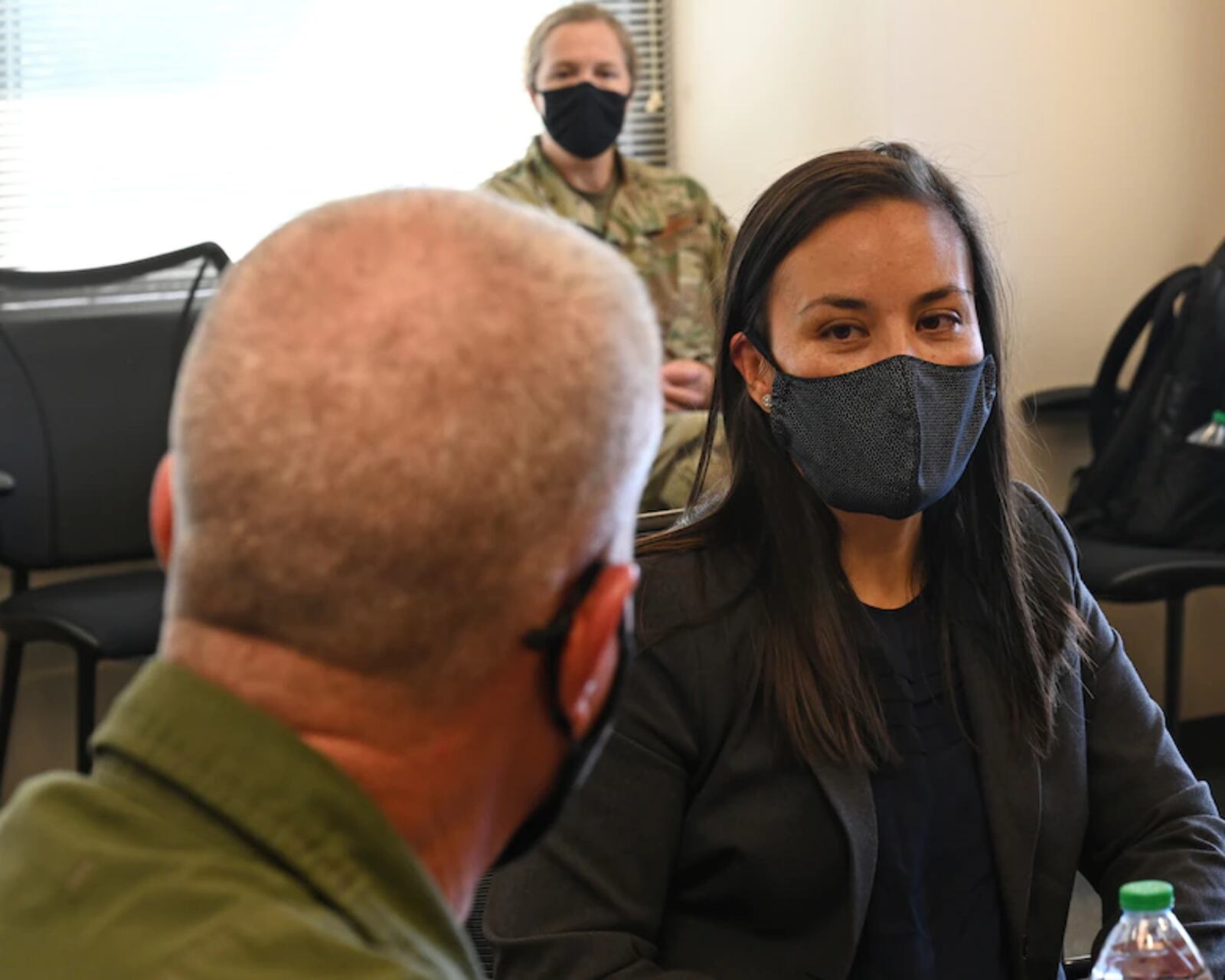 Brig. Gen. Paul Johnson, 175th Wing commander, speaks with Under Secretary of the Air Force Gina Ortiz Jones at Warfield Air National Guard Base at Martin State Airport, Middle River, Md., Sept. 11, 2021.  (U.S. Air National Guard photo by Master Sgt. Christopher Schepers)