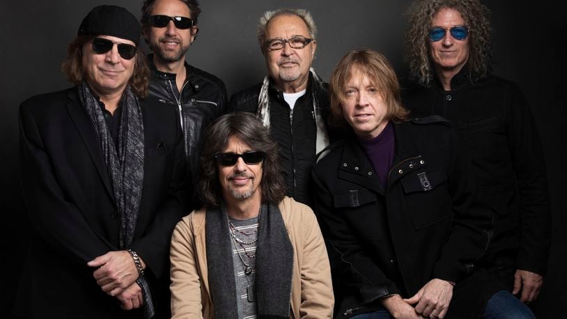 FILE - Thom Gimbel, from left, Michael Bluestein, Mick Jones, Kelly Hansen, Jeff Pilson and Bruce Watson of Foreigner pose for a portrait during the Sundance Film Festival in Park City, Utah on Jan. 20, 2017. (Photo by Taylor Jewell/Invision/AP, File)